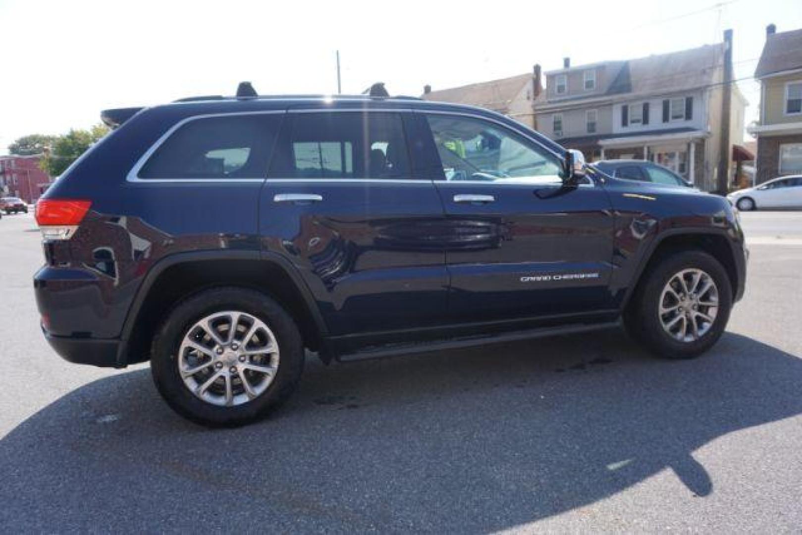 2015 True Blue Pearlcoat /Light Frost Beige/Black Jeep Grand Cherokee Limited 4WD (1C4RJFBG9FC) with an 3.6L V6 DOHC 24V engine, 8-Speed Automatic transmission, located at 312 Centre Ave, Schuylkill Haven, PA, 17972, (570) 593-5278, 40.638130, -76.177383 - adaptive cruise control, adv tech pkg, back up camera, blind spot monitor, collision avoidance system, heated front seats, lane departure warning, leather seats, navigation system, power liftgate, power sunroof, rear parking sensors, universal garage door opener - Photo#10