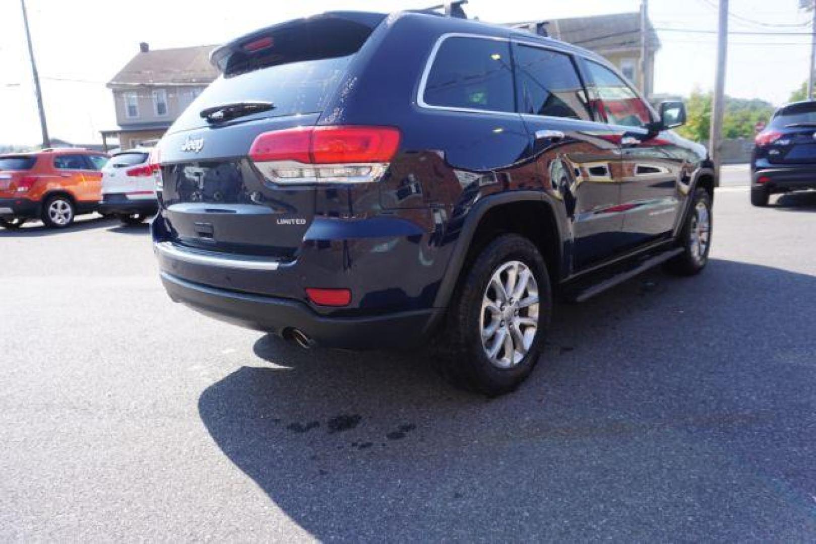 2015 True Blue Pearlcoat /Light Frost Beige/Black Jeep Grand Cherokee Limited 4WD (1C4RJFBG9FC) with an 3.6L V6 DOHC 24V engine, 8-Speed Automatic transmission, located at 312 Centre Ave, Schuylkill Haven, PA, 17972, (570) 593-5278, 40.638130, -76.177383 - adaptive cruise control, adv tech pkg, back up camera, blind spot monitor, collision avoidance system, heated front seats, lane departure warning, leather seats, navigation system, power liftgate, power sunroof, rear parking sensors, universal garage door opener - Photo#11