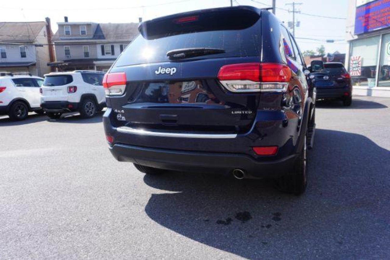 2015 True Blue Pearlcoat /Light Frost Beige/Black Jeep Grand Cherokee Limited 4WD (1C4RJFBG9FC) with an 3.6L V6 DOHC 24V engine, 8-Speed Automatic transmission, located at 312 Centre Ave, Schuylkill Haven, PA, 17972, (570) 593-5278, 40.638130, -76.177383 - adaptive cruise control, adv tech pkg, back up camera, blind spot monitor, collision avoidance system, heated front seats, lane departure warning, leather seats, navigation system, power liftgate, power sunroof, rear parking sensors, universal garage door opener - Photo#12