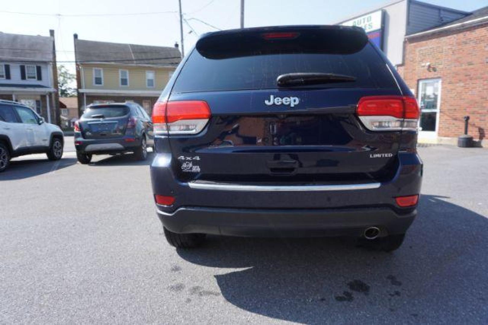 2015 True Blue Pearlcoat /Light Frost Beige/Black Jeep Grand Cherokee Limited 4WD (1C4RJFBG9FC) with an 3.6L V6 DOHC 24V engine, 8-Speed Automatic transmission, located at 312 Centre Ave, Schuylkill Haven, PA, 17972, (570) 593-5278, 40.638130, -76.177383 - adaptive cruise control, adv tech pkg, back up camera, blind spot monitor, collision avoidance system, heated front seats, lane departure warning, leather seats, navigation system, power liftgate, power sunroof, rear parking sensors, universal garage door opener - Photo#13