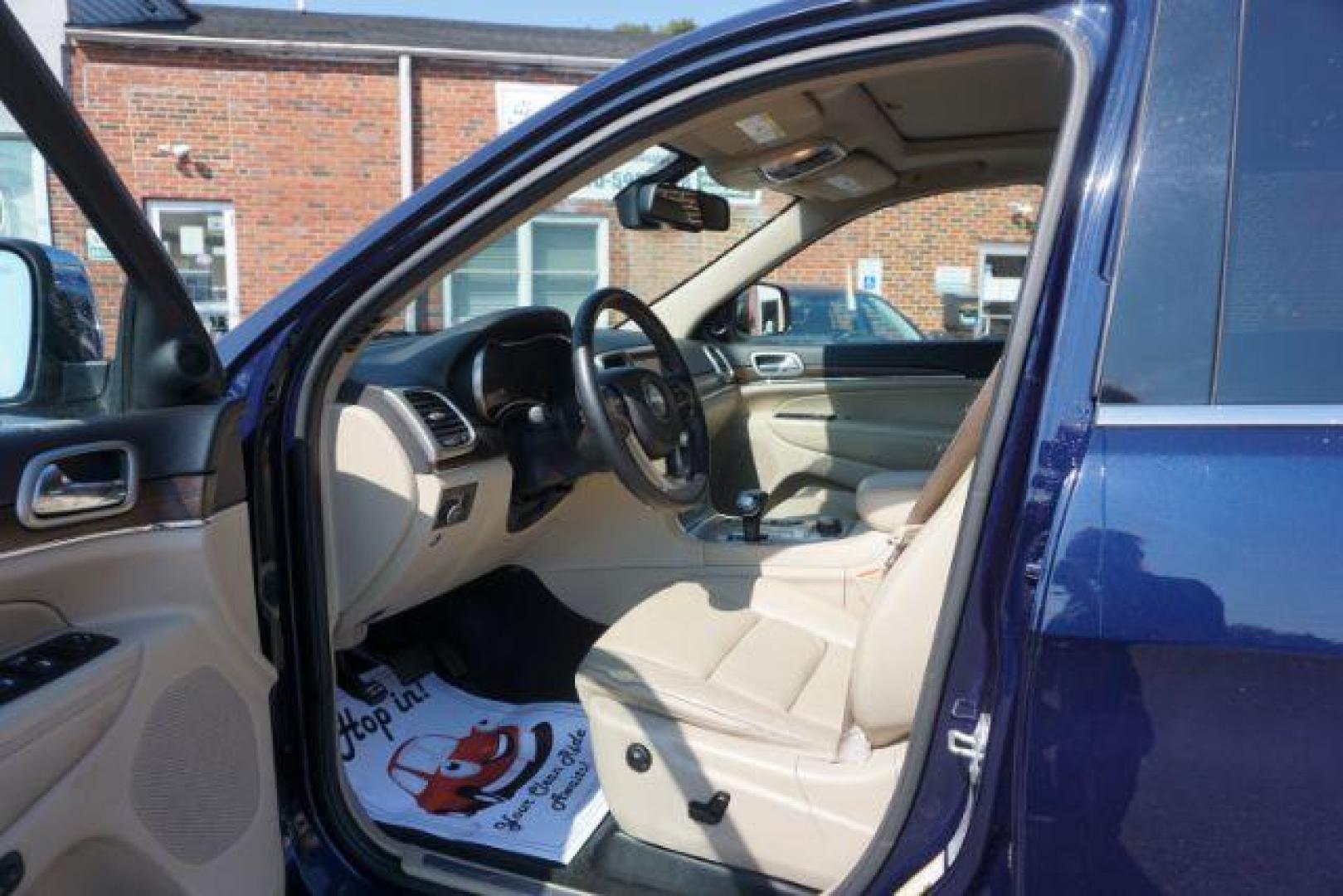 2015 True Blue Pearlcoat /Light Frost Beige/Black Jeep Grand Cherokee Limited 4WD (1C4RJFBG9FC) with an 3.6L V6 DOHC 24V engine, 8-Speed Automatic transmission, located at 312 Centre Ave, Schuylkill Haven, PA, 17972, (570) 593-5278, 40.638130, -76.177383 - adaptive cruise control, adv tech pkg, back up camera, blind spot monitor, collision avoidance system, heated front seats, lane departure warning, leather seats, navigation system, power liftgate, power sunroof, rear parking sensors, universal garage door opener - Photo#20