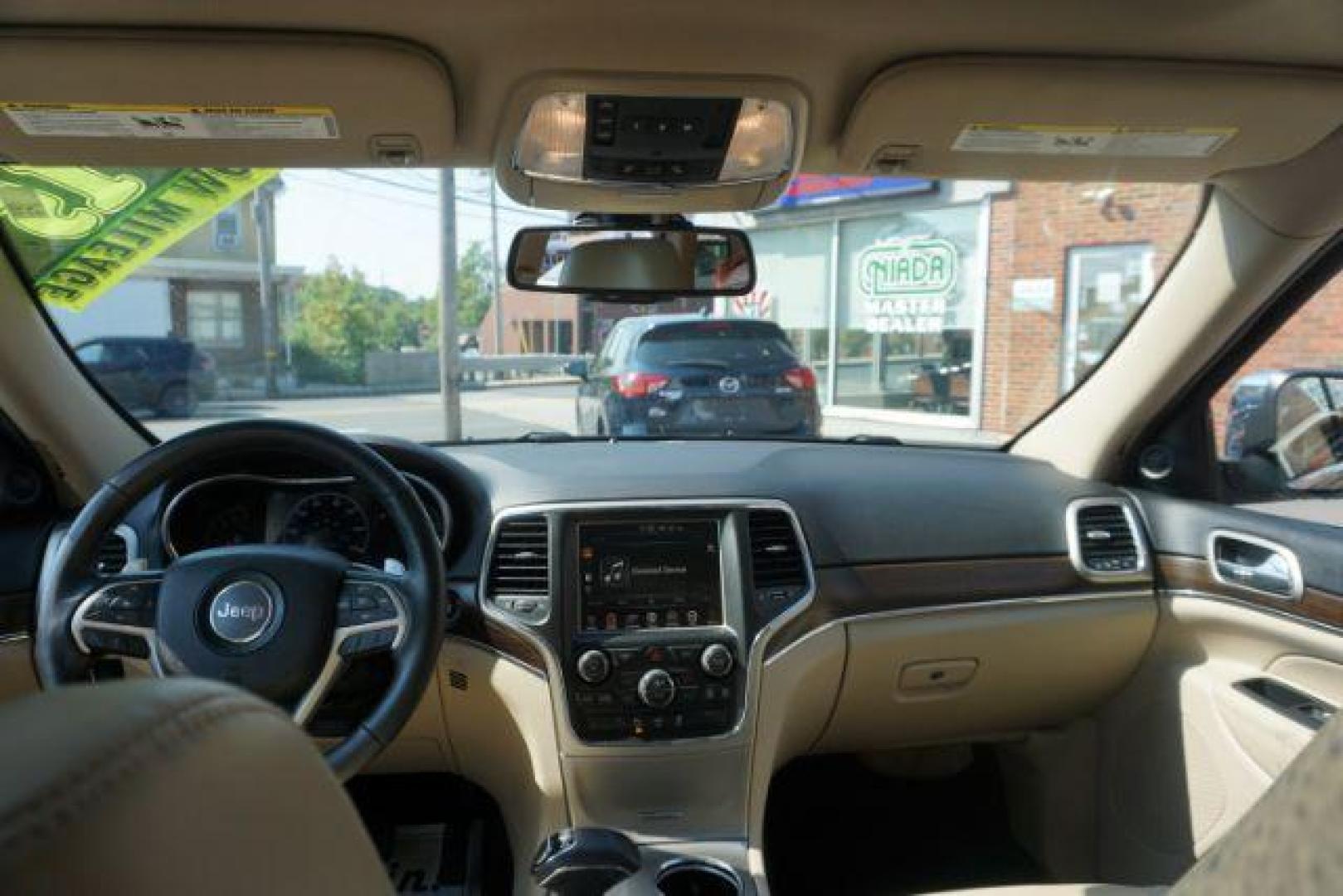 2015 True Blue Pearlcoat /Light Frost Beige/Black Jeep Grand Cherokee Limited 4WD (1C4RJFBG9FC) with an 3.6L V6 DOHC 24V engine, 8-Speed Automatic transmission, located at 312 Centre Ave, Schuylkill Haven, PA, 17972, (570) 593-5278, 40.638130, -76.177383 - adaptive cruise control, adv tech pkg, back up camera, blind spot monitor, collision avoidance system, heated front seats, lane departure warning, leather seats, navigation system, power liftgate, power sunroof, rear parking sensors, universal garage door opener - Photo#41