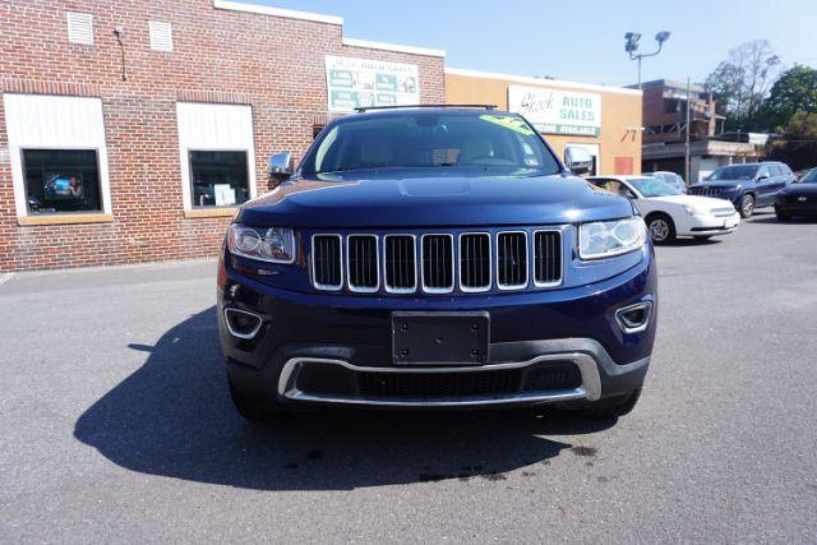 2015 True Blue Pearlcoat /Light Frost Beige/Black Jeep Grand Cherokee Limited 4WD (1C4RJFBG9FC) with an 3.6L V6 DOHC 24V engine, 8-Speed Automatic transmission, located at 312 Centre Ave, Schuylkill Haven, PA, 17972, (570) 593-5278, 40.638130, -76.177383 - adaptive cruise control, adv tech pkg, back up camera, blind spot monitor, collision avoidance system, heated front seats, lane departure warning, leather seats, navigation system, power liftgate, power sunroof, rear parking sensors, universal garage door opener - Photo#4