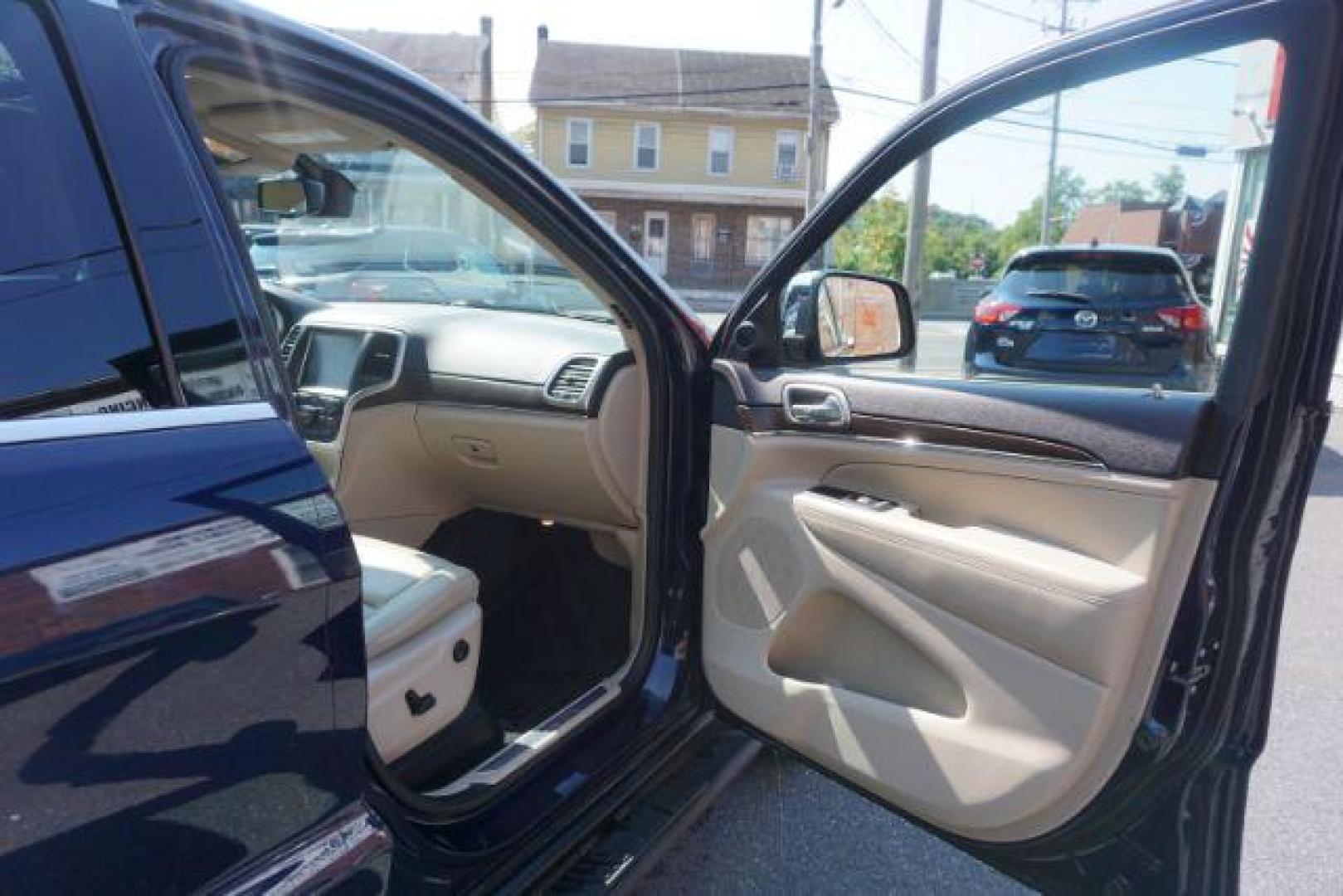 2015 True Blue Pearlcoat /Light Frost Beige/Black Jeep Grand Cherokee Limited 4WD (1C4RJFBG9FC) with an 3.6L V6 DOHC 24V engine, 8-Speed Automatic transmission, located at 312 Centre Ave, Schuylkill Haven, PA, 17972, (570) 593-5278, 40.638130, -76.177383 - adaptive cruise control, adv tech pkg, back up camera, blind spot monitor, collision avoidance system, heated front seats, lane departure warning, leather seats, navigation system, power liftgate, power sunroof, rear parking sensors, universal garage door opener - Photo#49