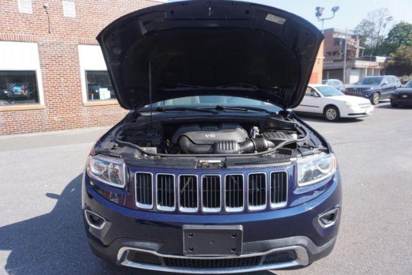 2015 True Blue Pearlcoat /Light Frost Beige/Black Jeep Grand Cherokee Limited 4WD (1C4RJFBG9FC) with an 3.6L V6 DOHC 24V engine, 8-Speed Automatic transmission, located at 312 Centre Ave, Schuylkill Haven, PA, 17972, (570) 593-5278, 40.638130, -76.177383 - adaptive cruise control, adv tech pkg, back up camera, blind spot monitor, collision avoidance system, heated front seats, lane departure warning, leather seats, navigation system, power liftgate, power sunroof, rear parking sensors, universal garage door opener - Photo#56