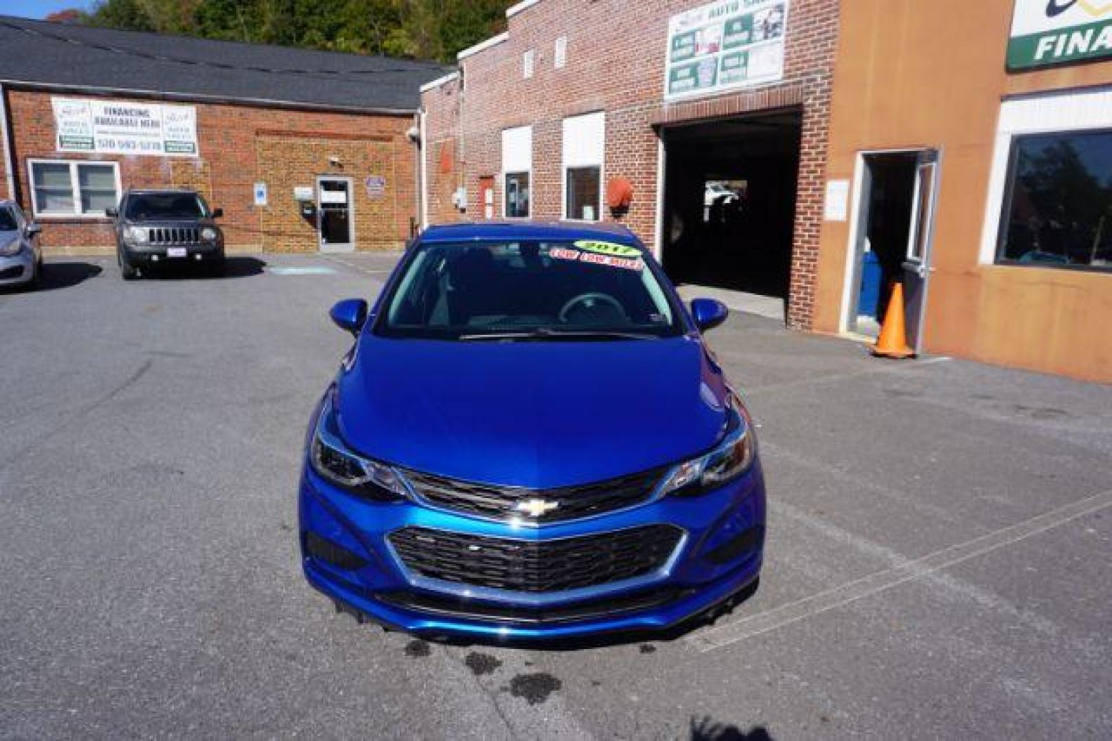 2017 Arctic Blue Metallic /Dark Atmosphere/Medium Atmosphere, cloth Chevrolet Cruze LT Auto (1G1BE5SM4H7) with an 1.4L L4 DOHC 16V TURBO engine, 6-Speed Automatic transmission, located at 312 Centre Ave, Schuylkill Haven, PA, 17972, (570) 593-5278, 40.638130, -76.177383 - heated front seats, passive keyless entry, power drivers seat, remote engine starter - Photo#4