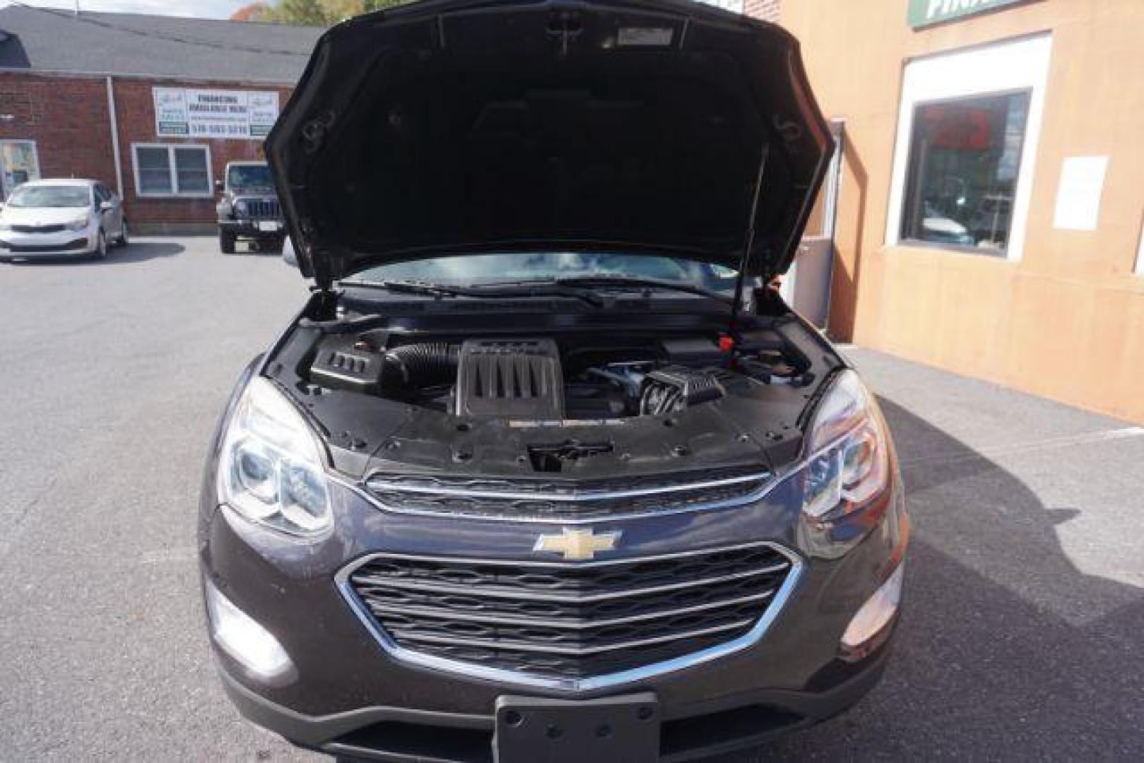 2016 Tungsten Metallic /Jet Black, premium cloth Chevrolet Equinox LT AWD (2GNFLFEK6G6) with an 2.4L L4 DOHC 16V FFV engine, 6-Speed Automatic transmission, located at 312 Centre Ave, Schuylkill Haven, PA, 17972, (570) 593-5278, 40.638130, -76.177383 - BLIND SPOT MONITOR, LUGGAGE RACK, NAVIGATION SYSTEM, REAR PARKING SENSORS - Photo#56