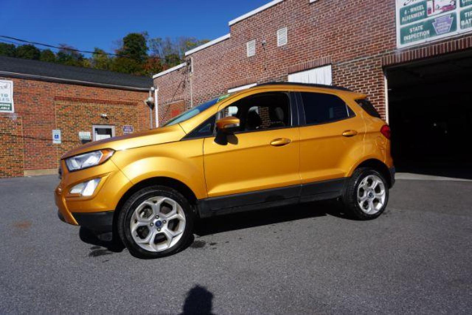 2021 yellow gold /black cloth Ford EcoSport SE AWD (MAJ6S3GL3MC) with an 2.0L L4 DOHC 16V engine, 6-Speed Automatic transmission, located at 312 Centre Ave, Schuylkill Haven, PA, 17972, (570) 593-5278, 40.638130, -76.177383 - LUGGAGE RACK, REMOTE ENGINE STARTER - Photo#0