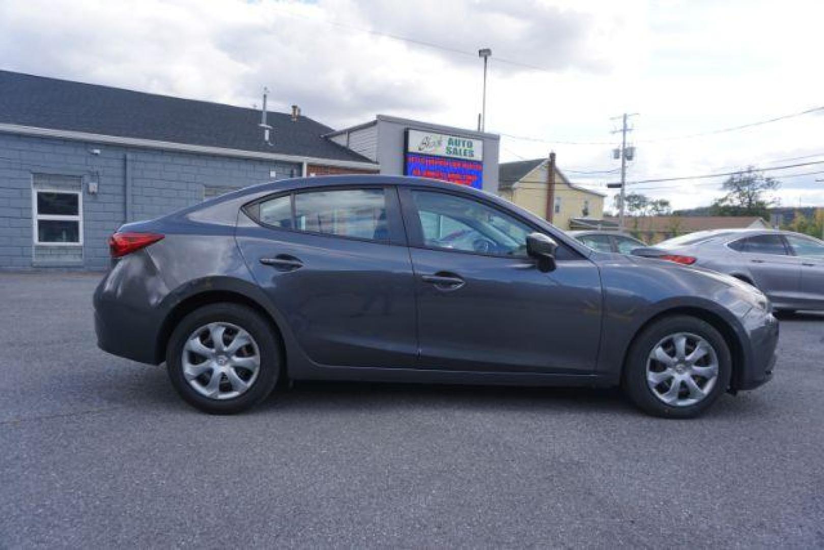 2016 Meteor Gray Mica /Black, premium cloth Mazda MAZDA3 i Sport AT 4-Door (JM1BM1T71G1) with an 2.0L L4 DOHC 16V engine, 6-Speed Automatic transmission, located at 312 Centre Ave, Schuylkill Haven, PA, 17972, (570) 593-5278, 40.638130, -76.177383 - Photo#0