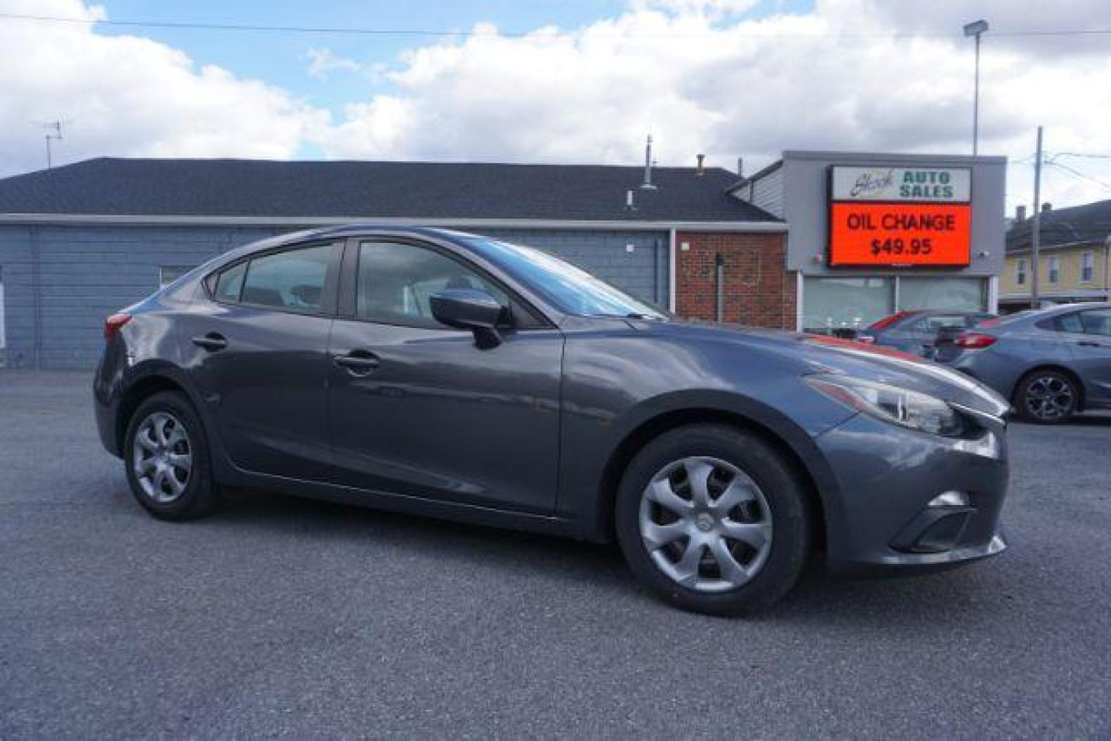 2016 Meteor Gray Mica /Black, premium cloth Mazda MAZDA3 i Sport AT 4-Door (JM1BM1T71G1) with an 2.0L L4 DOHC 16V engine, 6-Speed Automatic transmission, located at 312 Centre Ave, Schuylkill Haven, PA, 17972, (570) 593-5278, 40.638130, -76.177383 - Photo#1