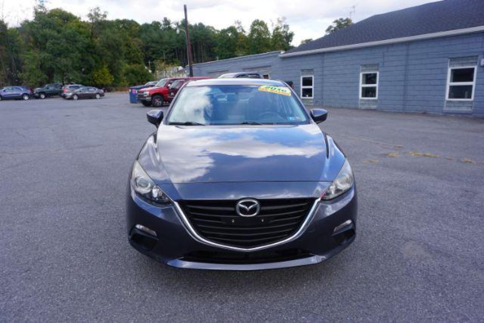 2016 Meteor Gray Mica /Black, premium cloth Mazda MAZDA3 i Sport AT 4-Door (JM1BM1T71G1) with an 2.0L L4 DOHC 16V engine, 6-Speed Automatic transmission, located at 312 Centre Ave, Schuylkill Haven, PA, 17972, (570) 593-5278, 40.638130, -76.177383 - Photo#4