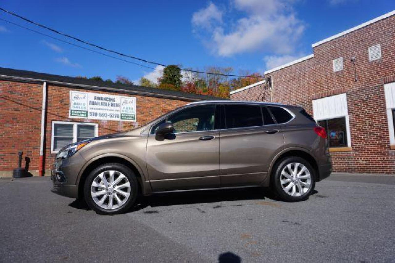 2016 Bronze Alloy Metallic /Light Neutral w/Ebony Interior Accents, leather Buick Envision Premium II AWD (LRBFXFSX0GD) with an 2.0L L4 DOHC 24V TURBO engine, 6-Speed Automatic transmission, located at 312 Centre Ave, Schuylkill Haven, PA, 17972, (570) 593-5278, 40.638130, -76.177383 - ADAPTIVE CRUISE CONTROL - Photo#0