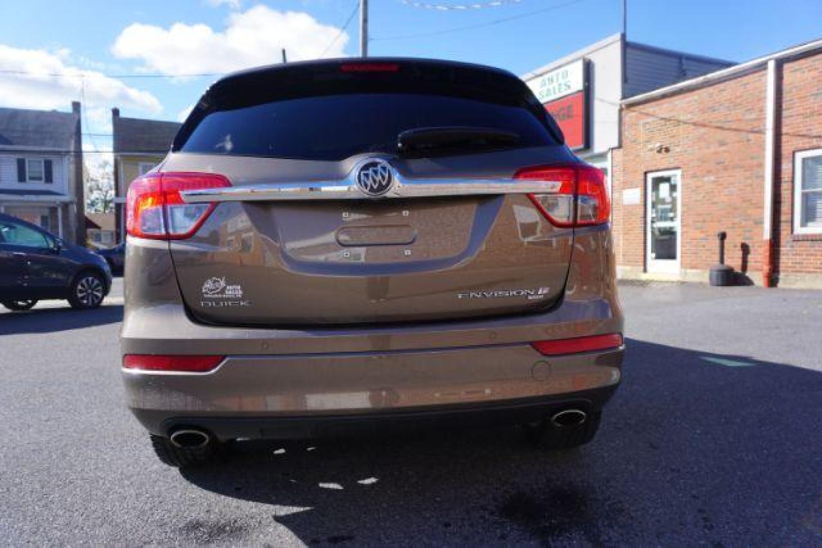 2016 Bronze Alloy Metallic /Light Neutral w/Ebony Interior Accents, leather Buick Envision Premium II AWD (LRBFXFSX0GD) with an 2.0L L4 DOHC 24V TURBO engine, 6-Speed Automatic transmission, located at 312 Centre Ave, Schuylkill Haven, PA, 17972, (570) 593-5278, 40.638130, -76.177383 - ADAPTIVE CRUISE CONTROL - Photo#10