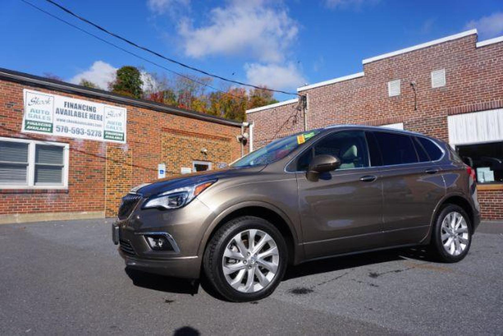 2016 Bronze Alloy Metallic /Light Neutral w/Ebony Interior Accents, leather Buick Envision Premium II AWD (LRBFXFSX0GD) with an 2.0L L4 DOHC 24V TURBO engine, 6-Speed Automatic transmission, located at 312 Centre Ave, Schuylkill Haven, PA, 17972, (570) 593-5278, 40.638130, -76.177383 - ADAPTIVE CRUISE CONTROL - Photo#1