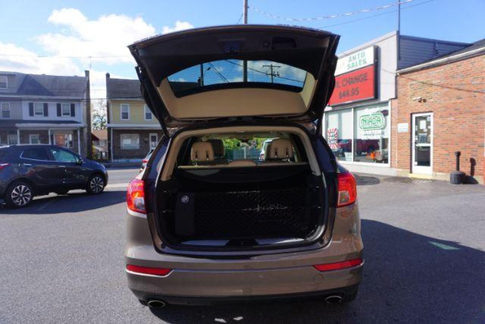 2016 Bronze Alloy Metallic /Light Neutral w/Ebony Interior Accents, leather Buick Envision Premium II AWD (LRBFXFSX0GD) with an 2.0L L4 DOHC 24V TURBO engine, 6-Speed Automatic transmission, located at 312 Centre Ave, Schuylkill Haven, PA, 17972, (570) 593-5278, 40.638130, -76.177383 - ADAPTIVE CRUISE CONTROL - Photo#43