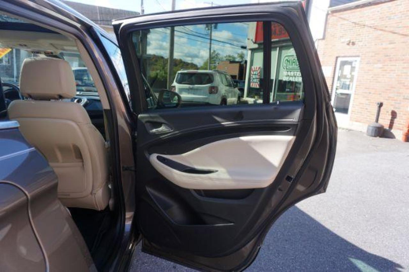 2016 Bronze Alloy Metallic /Light Neutral w/Ebony Interior Accents, leather Buick Envision Premium II AWD (LRBFXFSX0GD) with an 2.0L L4 DOHC 24V TURBO engine, 6-Speed Automatic transmission, located at 312 Centre Ave, Schuylkill Haven, PA, 17972, (570) 593-5278, 40.638130, -76.177383 - ADAPTIVE CRUISE CONTROL - Photo#46