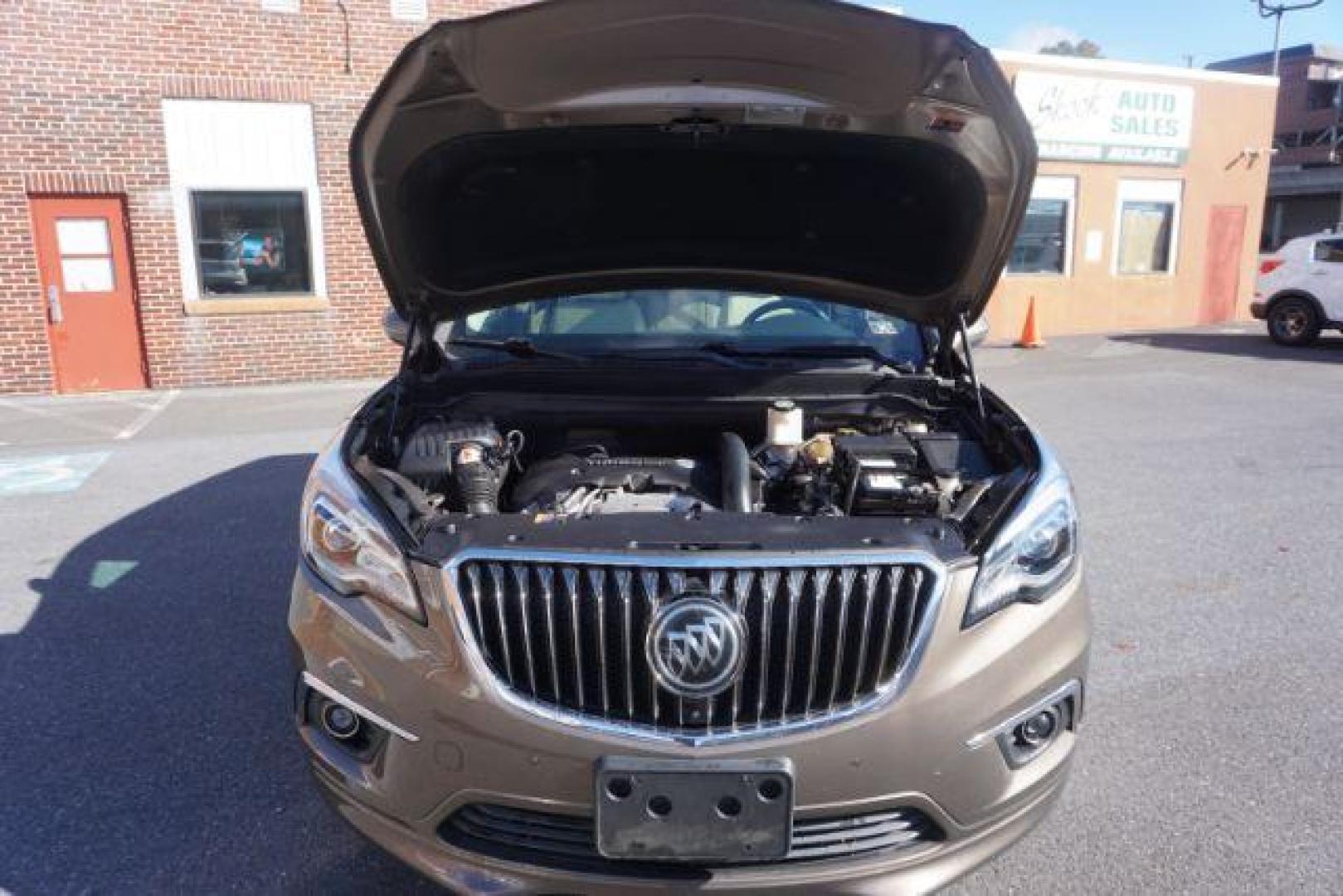 2016 Bronze Alloy Metallic /Light Neutral w/Ebony Interior Accents, leather Buick Envision Premium II AWD (LRBFXFSX0GD) with an 2.0L L4 DOHC 24V TURBO engine, 6-Speed Automatic transmission, located at 312 Centre Ave, Schuylkill Haven, PA, 17972, (570) 593-5278, 40.638130, -76.177383 - ADAPTIVE CRUISE CONTROL - Photo#60