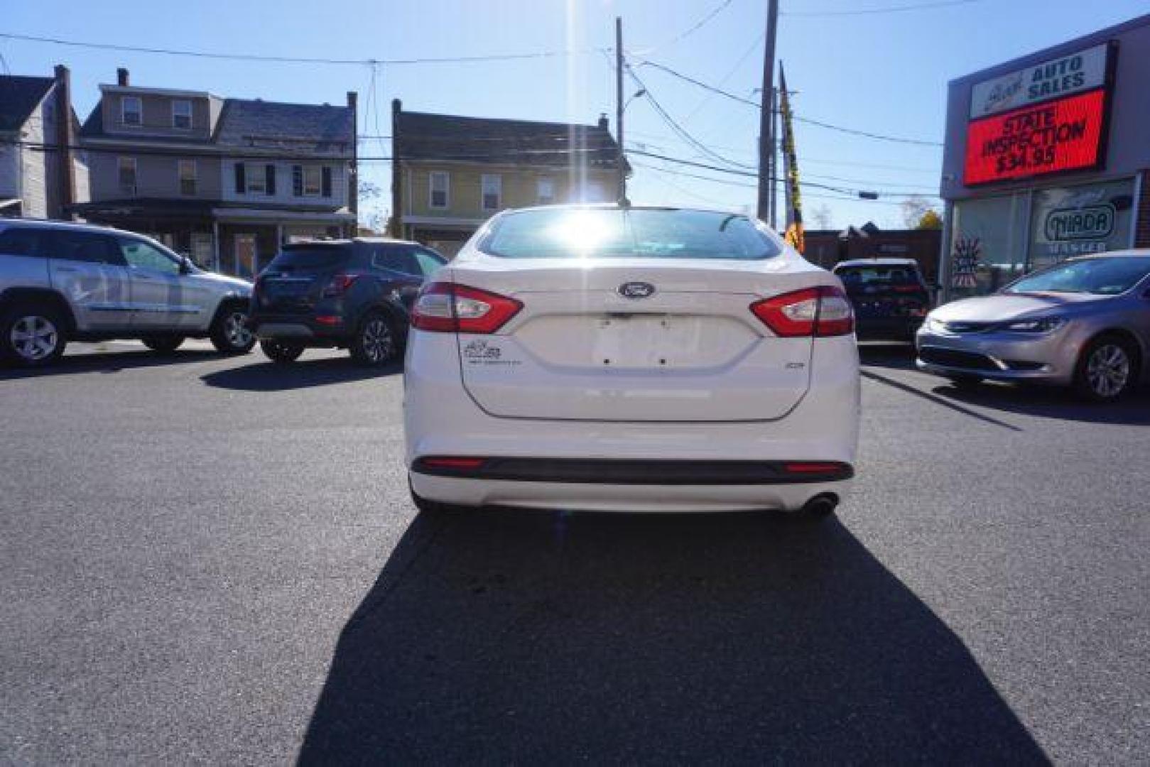 2016 White Platinum Metallic Tri-Coat /Charcoal Black, cloth Ford Fusion SE (1FA6P0H73G5) with an 2.5L L4 DOHC 16V engine, 6-Speed Automatic transmission, located at 312 Centre Ave, Schuylkill Haven, PA, 17972, (570) 593-5278, 40.638130, -76.177383 - fog lights, rear parking sensors - Photo#12