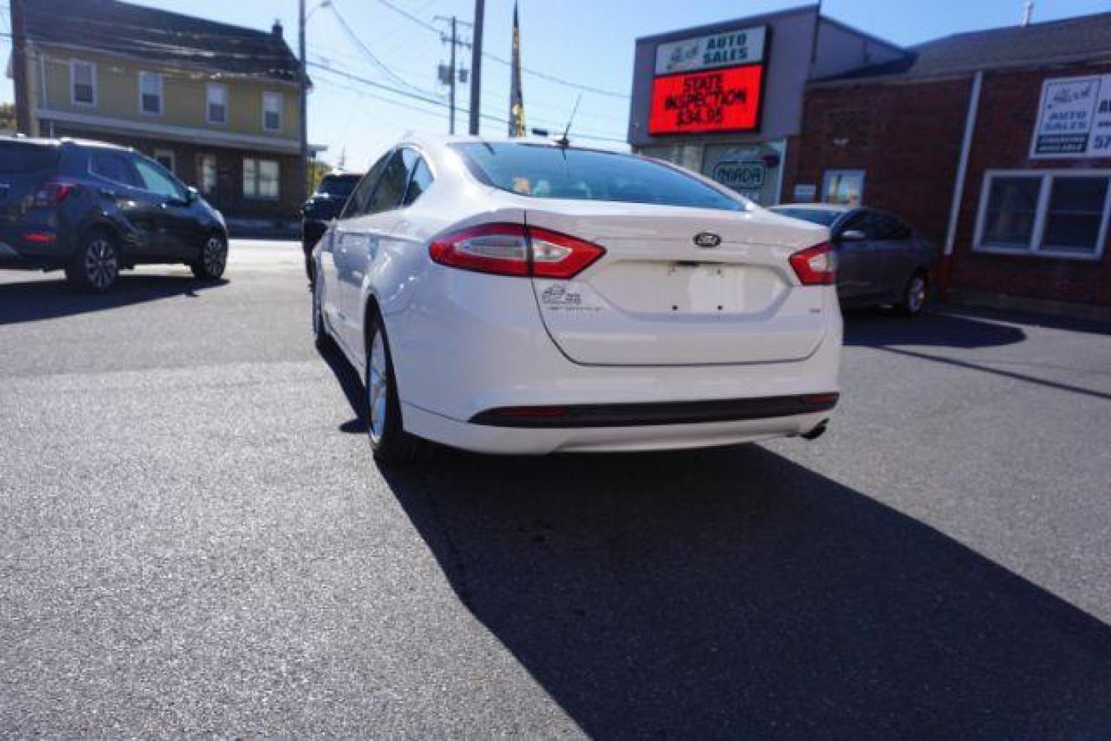 2016 White Platinum Metallic Tri-Coat /Charcoal Black, cloth Ford Fusion SE (1FA6P0H73G5) with an 2.5L L4 DOHC 16V engine, 6-Speed Automatic transmission, located at 312 Centre Ave, Schuylkill Haven, PA, 17972, (570) 593-5278, 40.638130, -76.177383 - fog lights, rear parking sensors - Photo#13