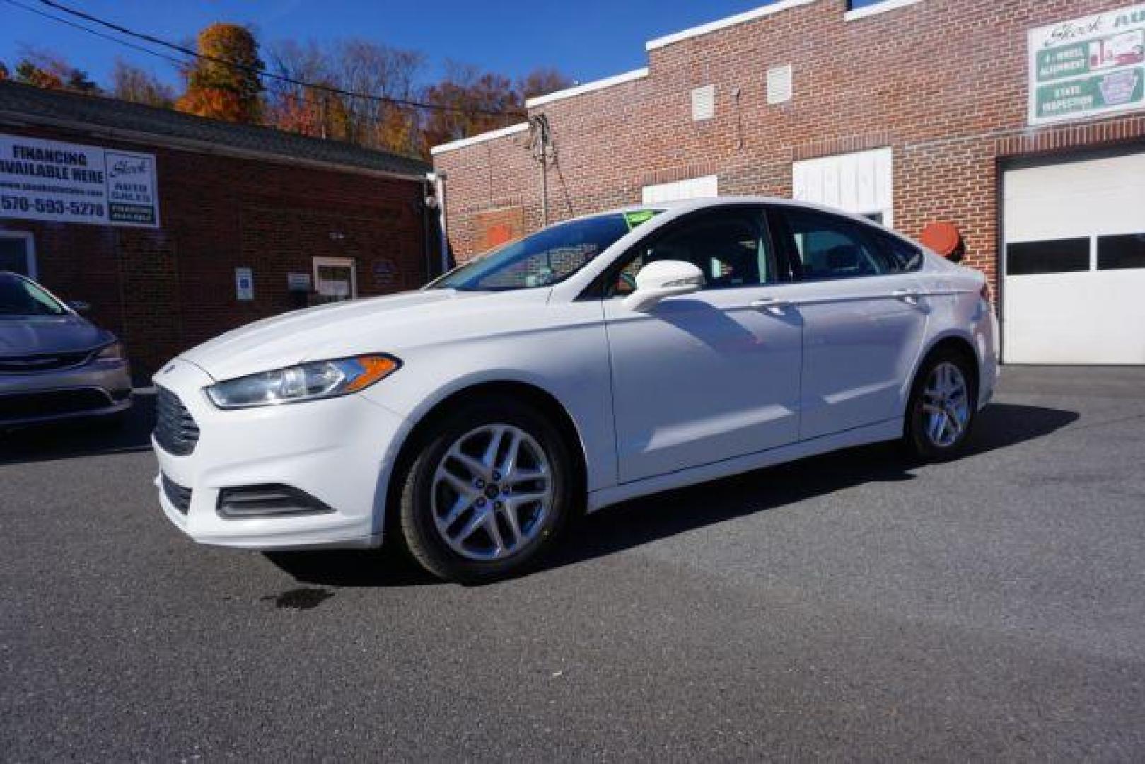 2016 White Platinum Metallic Tri-Coat /Charcoal Black, cloth Ford Fusion SE (1FA6P0H73G5) with an 2.5L L4 DOHC 16V engine, 6-Speed Automatic transmission, located at 312 Centre Ave, Schuylkill Haven, PA, 17972, (570) 593-5278, 40.638130, -76.177383 - fog lights, rear parking sensors - Photo#1