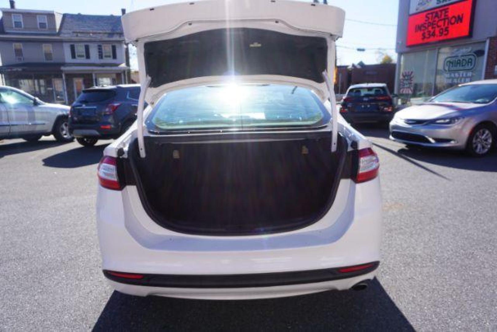 2016 White Platinum Metallic Tri-Coat /Charcoal Black, cloth Ford Fusion SE (1FA6P0H73G5) with an 2.5L L4 DOHC 16V engine, 6-Speed Automatic transmission, located at 312 Centre Ave, Schuylkill Haven, PA, 17972, (570) 593-5278, 40.638130, -76.177383 - fog lights, rear parking sensors - Photo#43