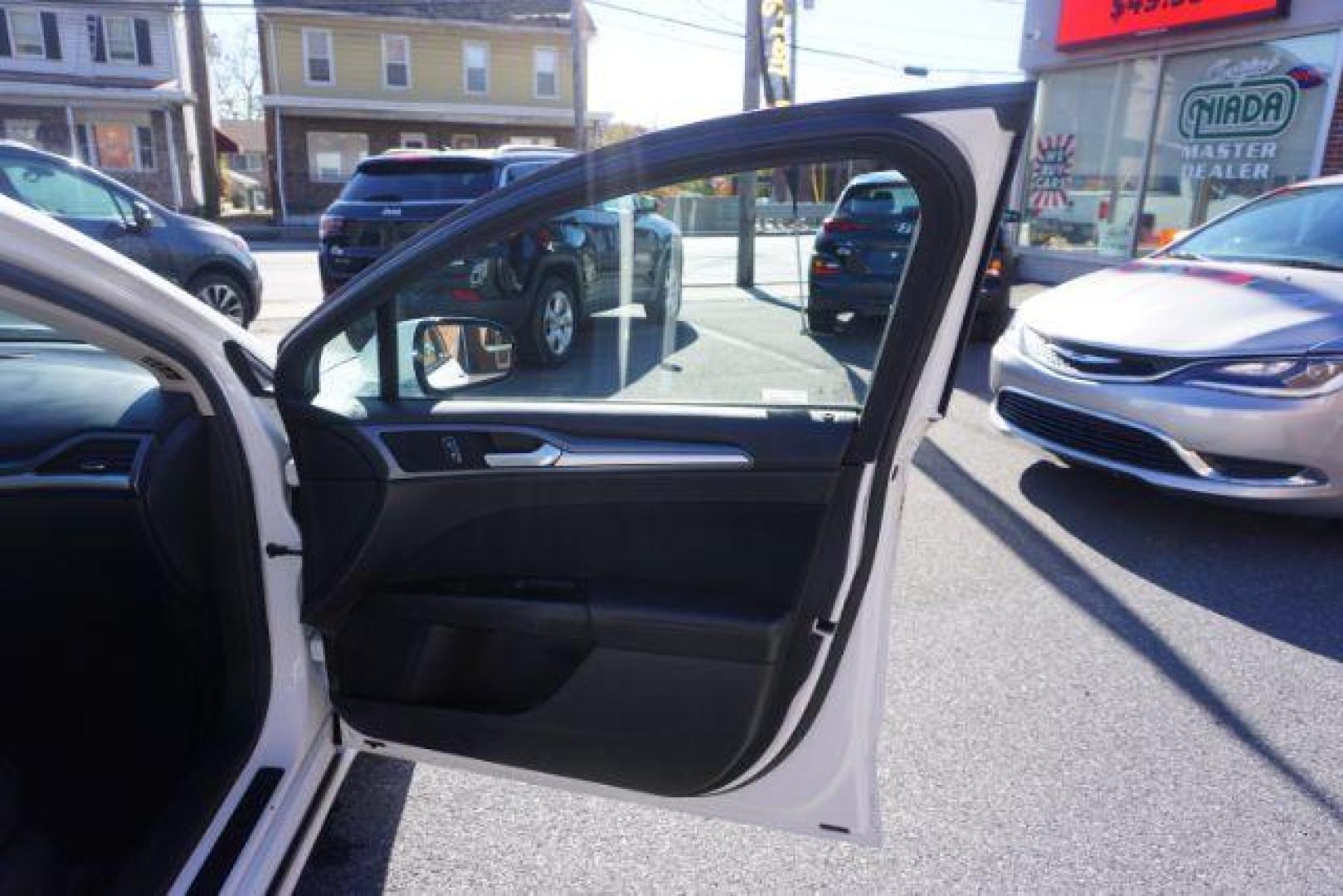 2016 White Platinum Metallic Tri-Coat /Charcoal Black, cloth Ford Fusion SE (1FA6P0H73G5) with an 2.5L L4 DOHC 16V engine, 6-Speed Automatic transmission, located at 312 Centre Ave, Schuylkill Haven, PA, 17972, (570) 593-5278, 40.638130, -76.177383 - fog lights, rear parking sensors - Photo#51