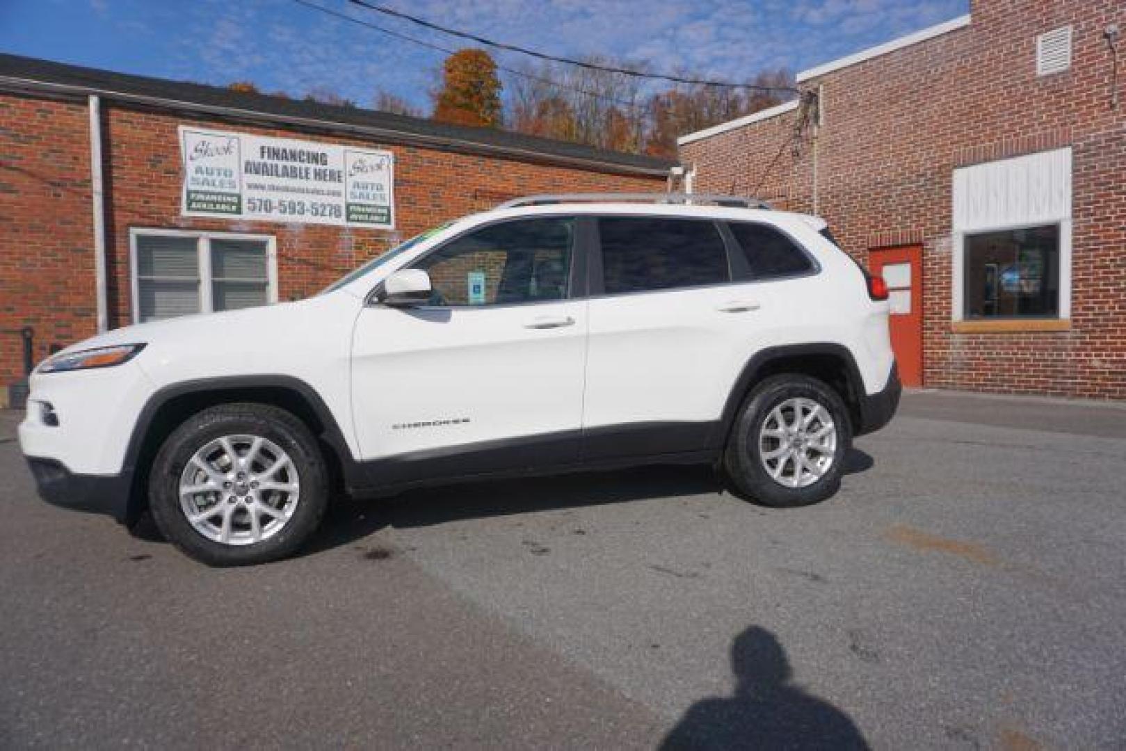 2016 Bright White Clear Coat /Black, premium cloth Jeep Cherokee Latitude 4WD (1C4PJMCS9GW) with an 3.2L V6 DOHC 24V engine, 9-Speed Automatic transmission, located at 312 Centre Ave, Schuylkill Haven, PA, 17972, (570) 593-5278, 40.638130, -76.177383 - navigation, passive keyless entry, power drivers seat - Photo#0