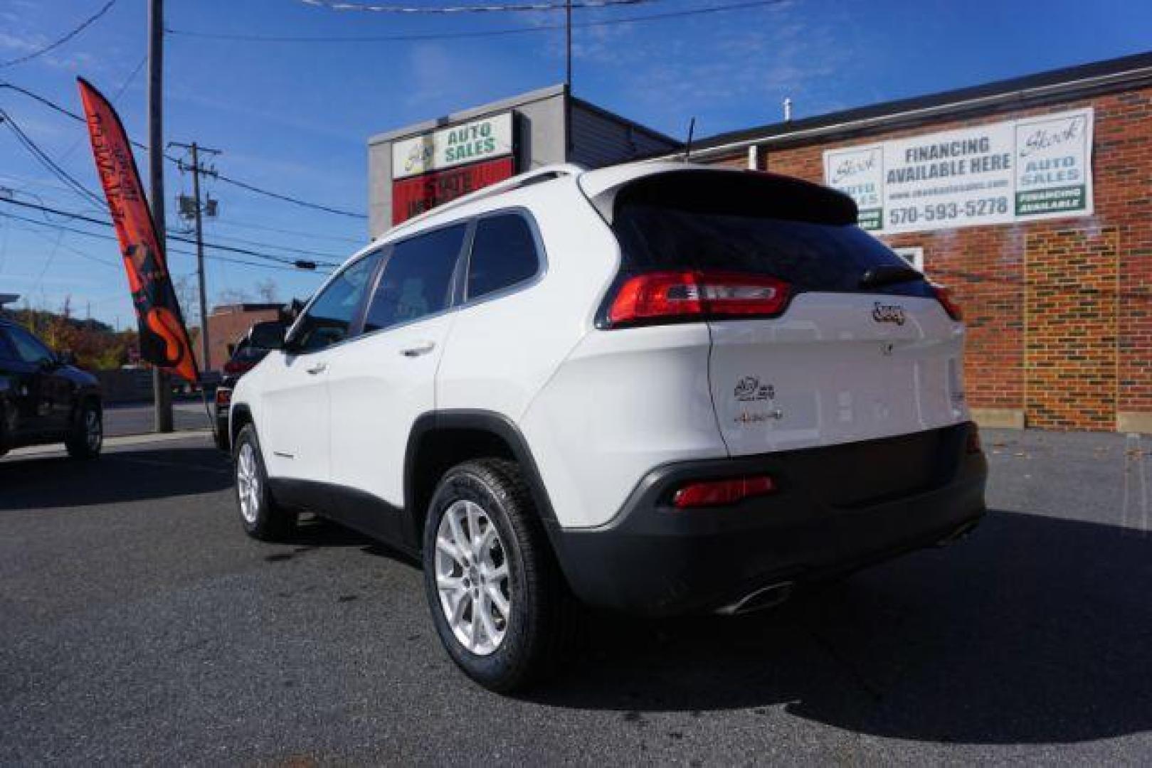 2016 Bright White Clear Coat /Black, premium cloth Jeep Cherokee Latitude 4WD (1C4PJMCS9GW) with an 3.2L V6 DOHC 24V engine, 9-Speed Automatic transmission, located at 312 Centre Ave, Schuylkill Haven, PA, 17972, (570) 593-5278, 40.638130, -76.177383 - navigation, passive keyless entry, power drivers seat - Photo#14