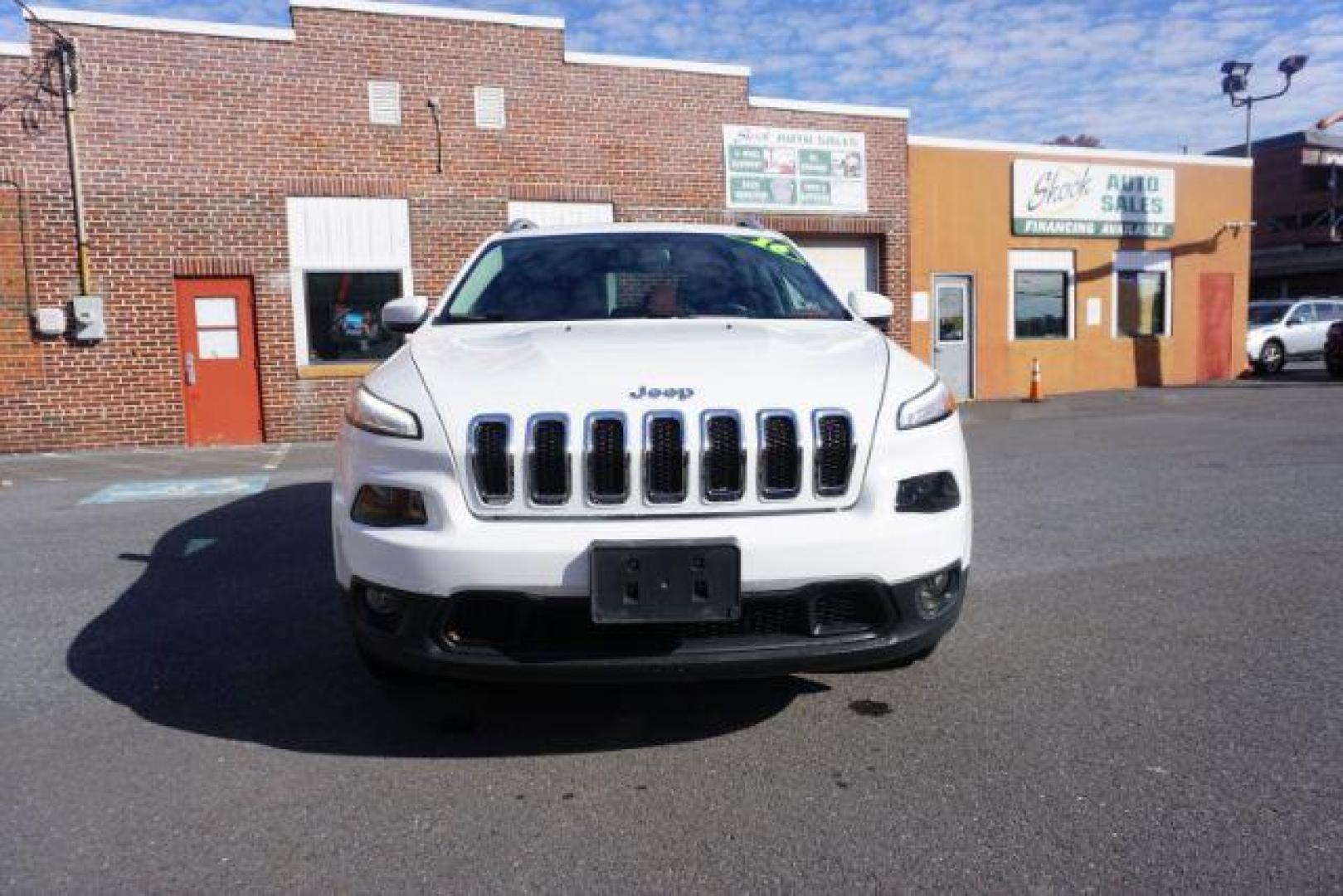 2016 Bright White Clear Coat /Black, premium cloth Jeep Cherokee Latitude 4WD (1C4PJMCS9GW) with an 3.2L V6 DOHC 24V engine, 9-Speed Automatic transmission, located at 312 Centre Ave, Schuylkill Haven, PA, 17972, (570) 593-5278, 40.638130, -76.177383 - navigation, passive keyless entry, power drivers seat - Photo#4