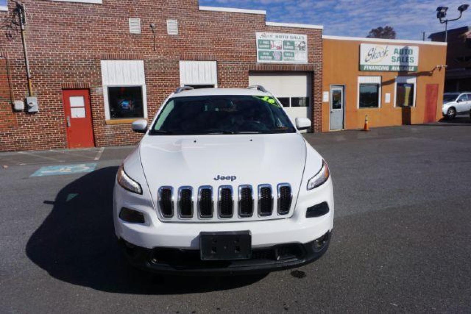 2016 Bright White Clear Coat /Black, premium cloth Jeep Cherokee Latitude 4WD (1C4PJMCS9GW) with an 3.2L V6 DOHC 24V engine, 9-Speed Automatic transmission, located at 312 Centre Ave, Schuylkill Haven, PA, 17972, (570) 593-5278, 40.638130, -76.177383 - navigation, passive keyless entry, power drivers seat - Photo#5