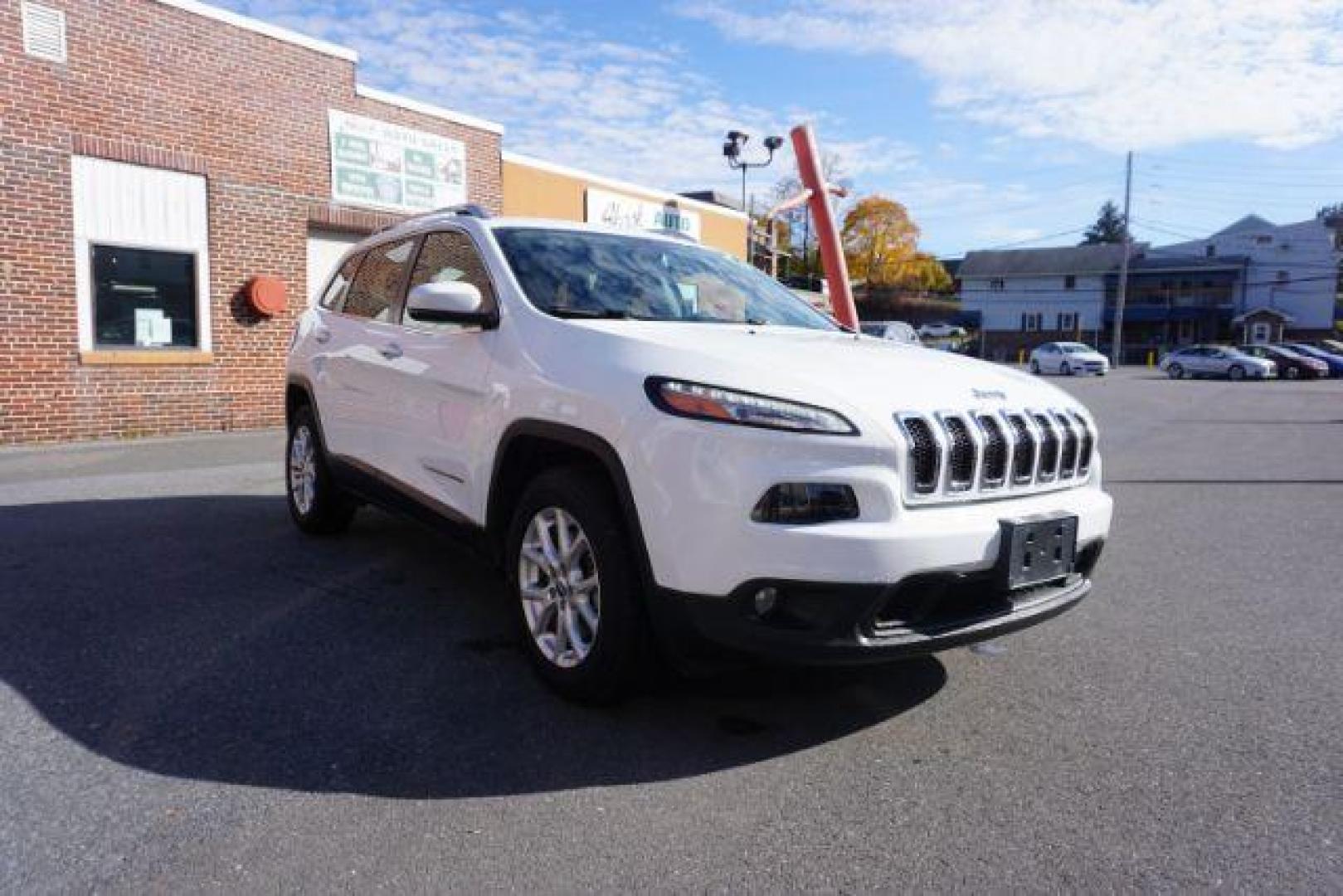 2016 Bright White Clear Coat /Black, premium cloth Jeep Cherokee Latitude 4WD (1C4PJMCS9GW) with an 3.2L V6 DOHC 24V engine, 9-Speed Automatic transmission, located at 312 Centre Ave, Schuylkill Haven, PA, 17972, (570) 593-5278, 40.638130, -76.177383 - navigation, passive keyless entry, power drivers seat - Photo#6