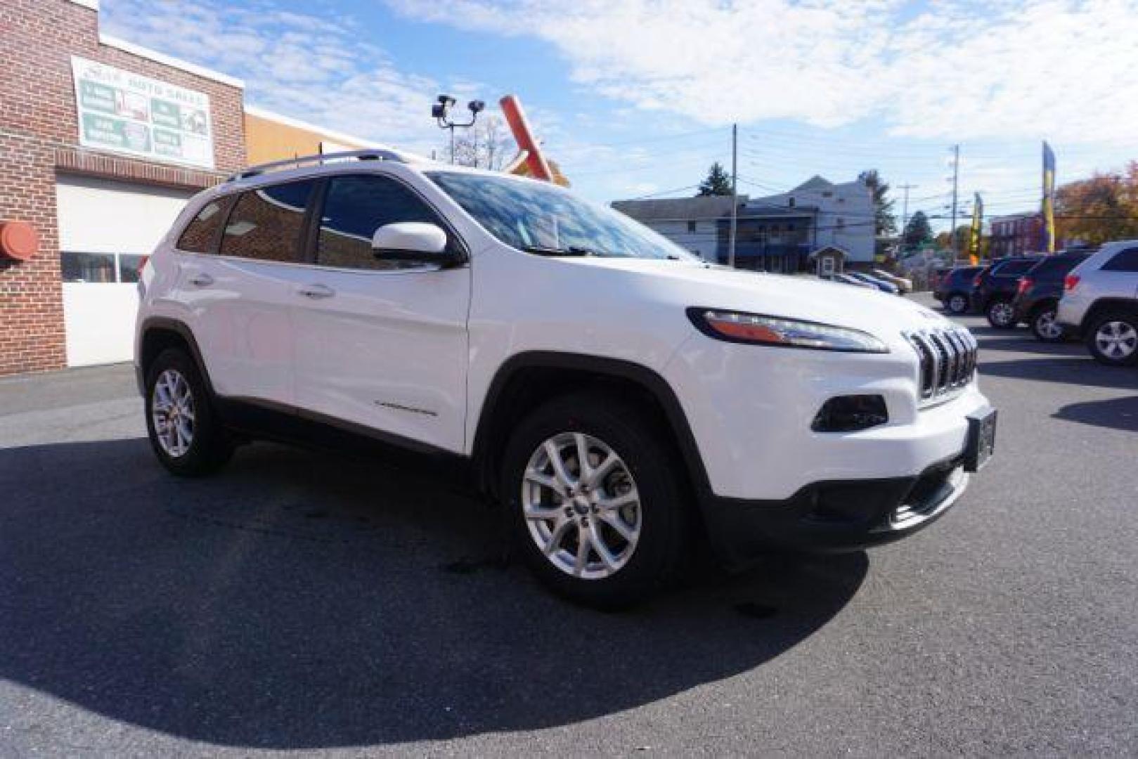 2016 Bright White Clear Coat /Black, premium cloth Jeep Cherokee Latitude 4WD (1C4PJMCS9GW) with an 3.2L V6 DOHC 24V engine, 9-Speed Automatic transmission, located at 312 Centre Ave, Schuylkill Haven, PA, 17972, (570) 593-5278, 40.638130, -76.177383 - navigation, passive keyless entry, power drivers seat - Photo#7