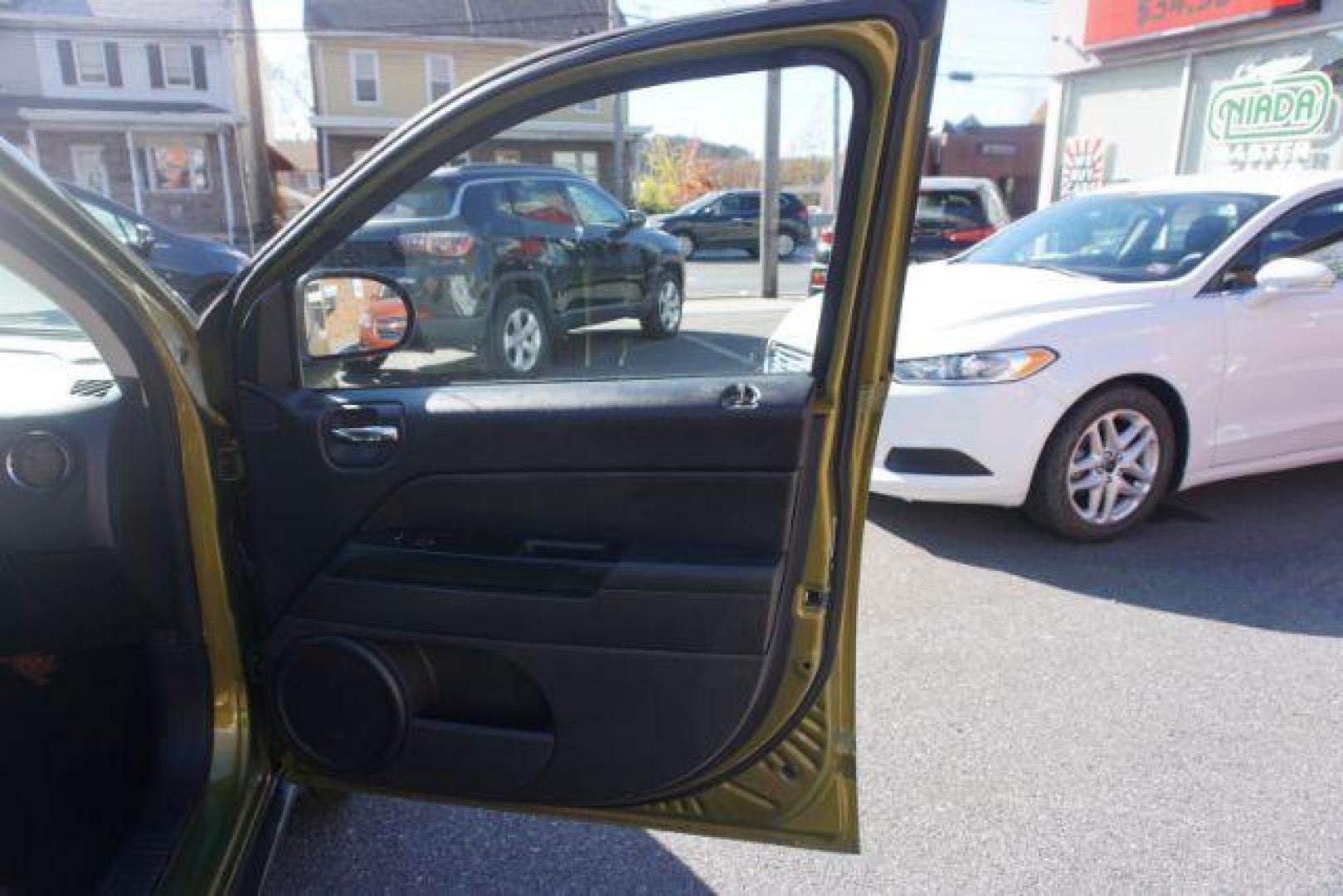 2012 Green lime Jeep Compass Latitude 4WD (1C4NJDEB9CD) with an 2.4L L4 DOHC 16V engine, Continuously Variable Transmission transmission, located at 312 Centre Ave, Schuylkill Haven, PA, 17972, (570) 593-5278, 40.638130, -76.177383 - Photo#50