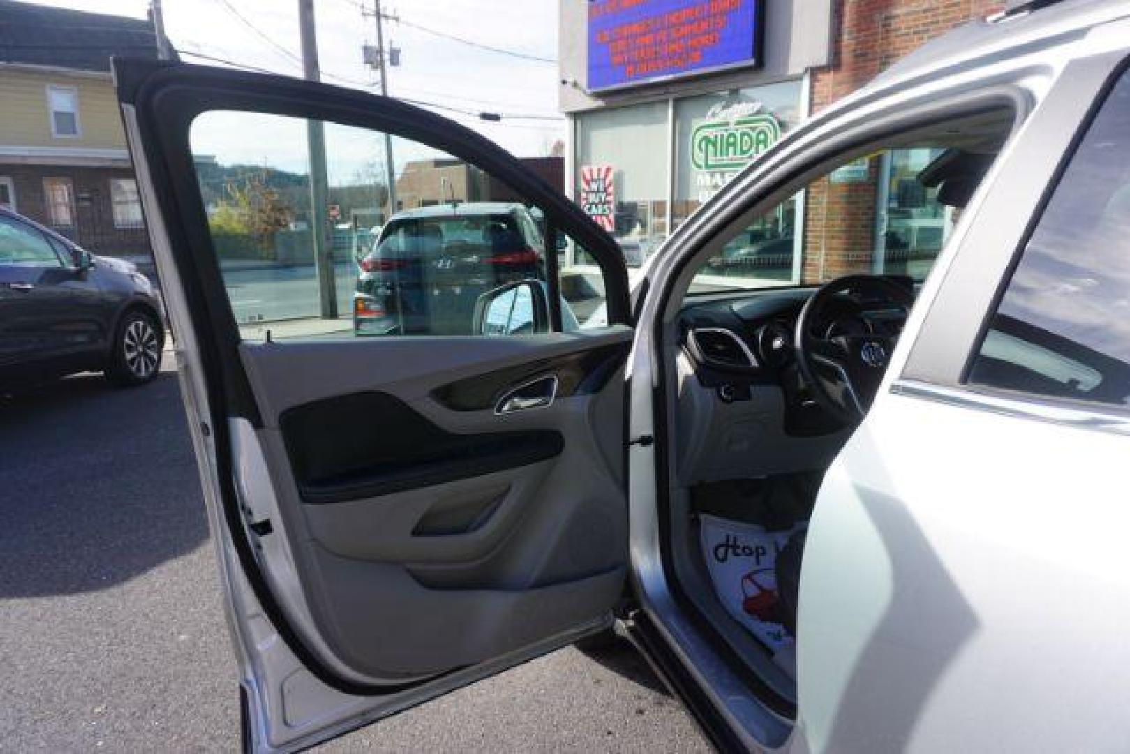 2015 Cocoa Silver Metallic/Dark Cocoa Ash /Ebony, vinyl/cloth Buick Encore Base AWD (KL4CJESB7FB) with an 1.4L L4 DOHC 16V TURBO engine, 6-Speed Automatic transmission, located at 312 Centre Ave, Schuylkill Haven, PA, 17972, (570) 593-5278, 40.638130, -76.177383 - Photo#18