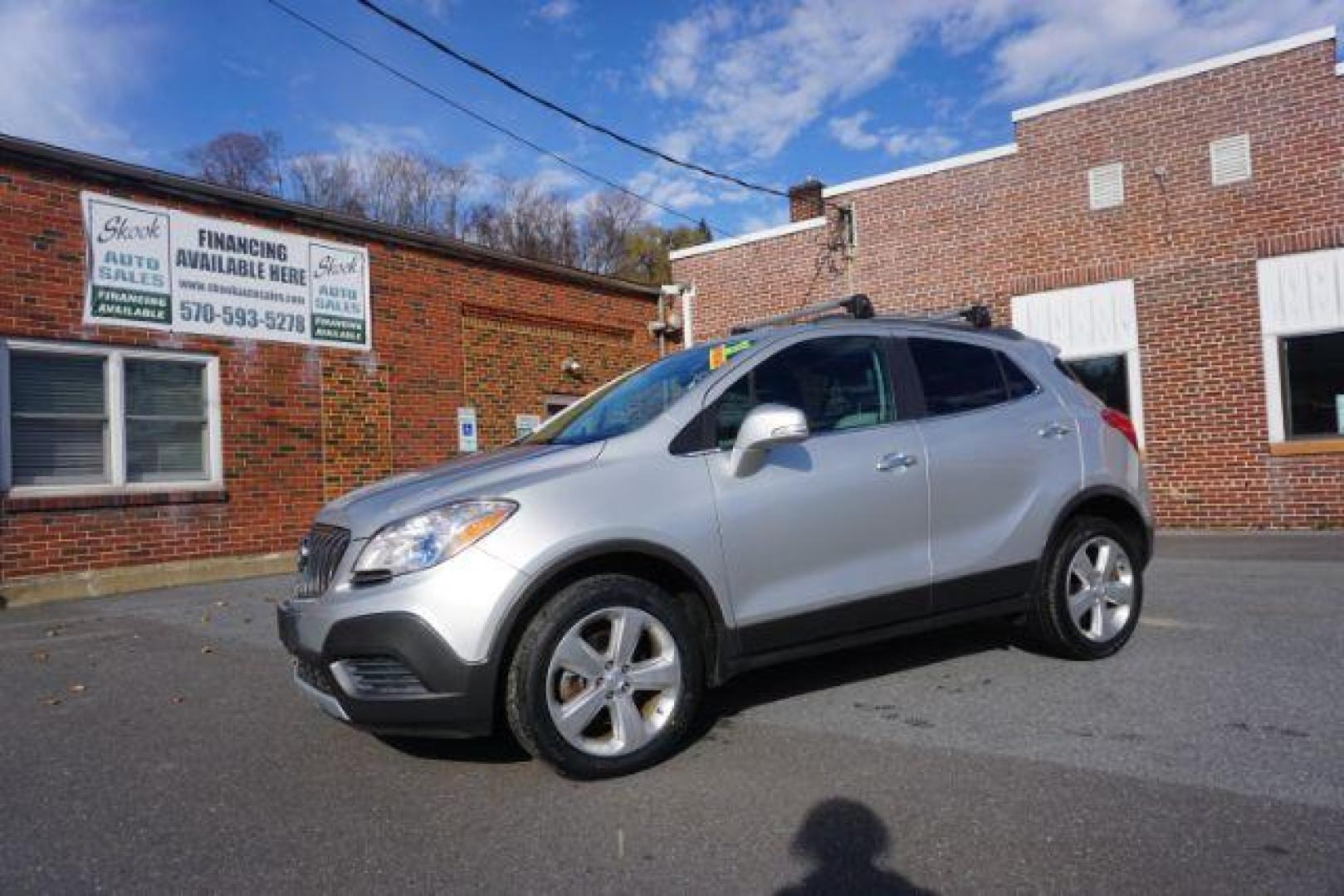 2015 Cocoa Silver Metallic/Dark Cocoa Ash /Ebony, vinyl/cloth Buick Encore Base AWD (KL4CJESB7FB) with an 1.4L L4 DOHC 16V TURBO engine, 6-Speed Automatic transmission, located at 312 Centre Ave, Schuylkill Haven, PA, 17972, (570) 593-5278, 40.638130, -76.177383 - Photo#1