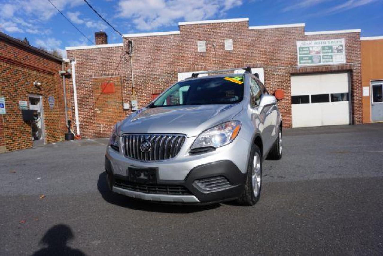 2015 Cocoa Silver Metallic/Dark Cocoa Ash /Ebony, vinyl/cloth Buick Encore Base AWD (KL4CJESB7FB) with an 1.4L L4 DOHC 16V TURBO engine, 6-Speed Automatic transmission, located at 312 Centre Ave, Schuylkill Haven, PA, 17972, (570) 593-5278, 40.638130, -76.177383 - Photo#2