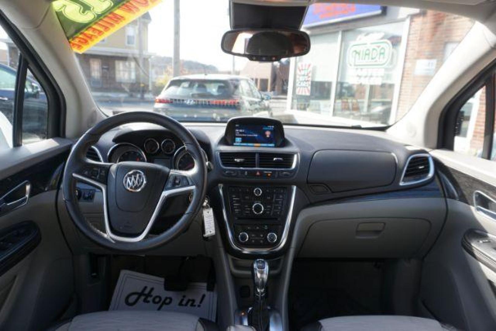 2015 Cocoa Silver Metallic/Dark Cocoa Ash /Ebony, vinyl/cloth Buick Encore Base AWD (KL4CJESB7FB) with an 1.4L L4 DOHC 16V TURBO engine, 6-Speed Automatic transmission, located at 312 Centre Ave, Schuylkill Haven, PA, 17972, (570) 593-5278, 40.638130, -76.177383 - Photo#40