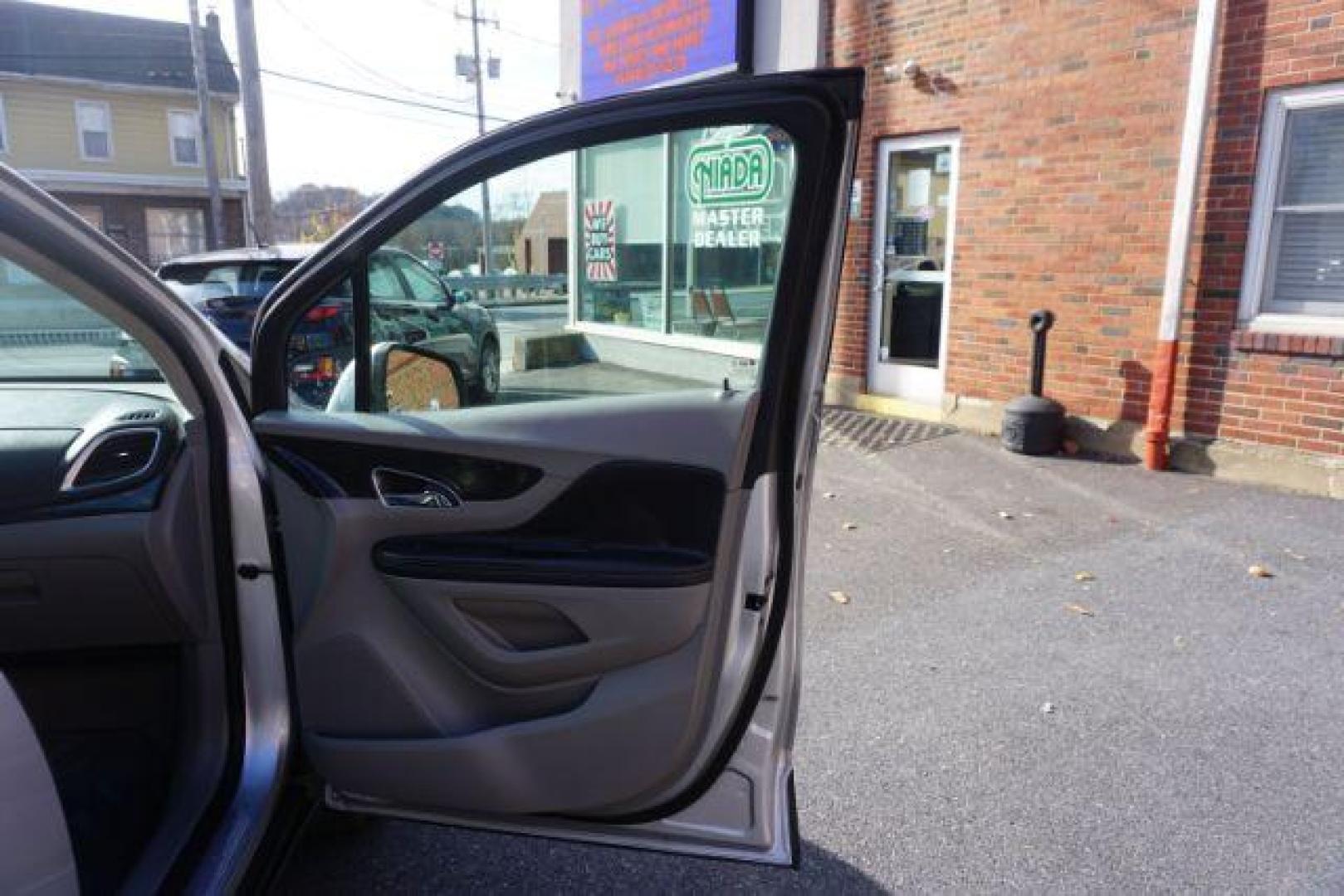 2015 Cocoa Silver Metallic/Dark Cocoa Ash /Ebony, vinyl/cloth Buick Encore Base AWD (KL4CJESB7FB) with an 1.4L L4 DOHC 16V TURBO engine, 6-Speed Automatic transmission, located at 312 Centre Ave, Schuylkill Haven, PA, 17972, (570) 593-5278, 40.638130, -76.177383 - Photo#49