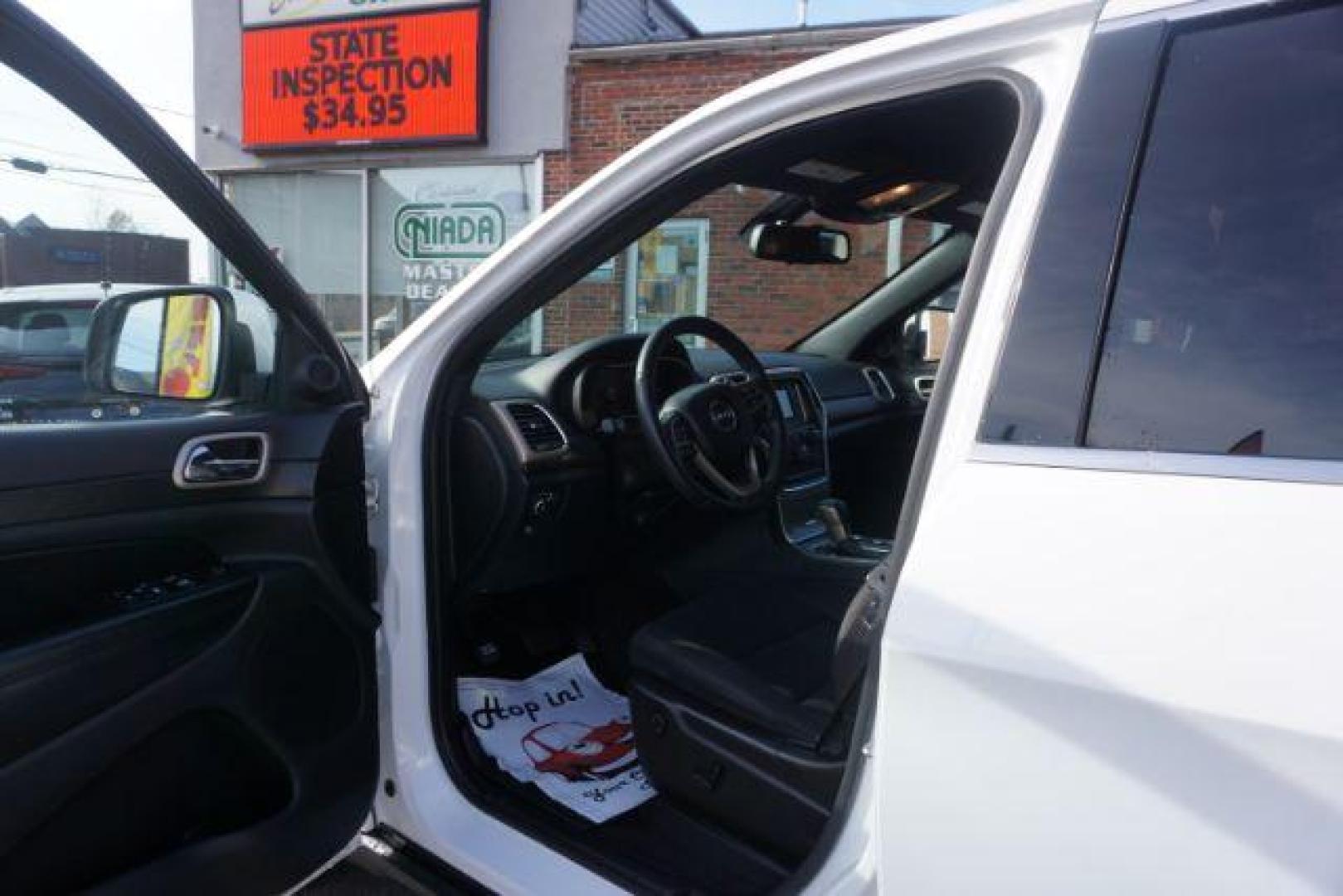 2016 Bright White Clear Coat /Black, cloth Jeep Grand Cherokee Laredo 4WD (1C4RJFAG1GC) with an 3.6L V6 DOHC 24V engine, 8-Speed Automatic transmission, located at 312 Centre Ave, Schuylkill Haven, PA, 17972, (570) 593-5278, 40.638130, -76.177383 - back up camera, locking/limited slip diff, luggage rack, luggage rack, rear parking sensors - Photo#20