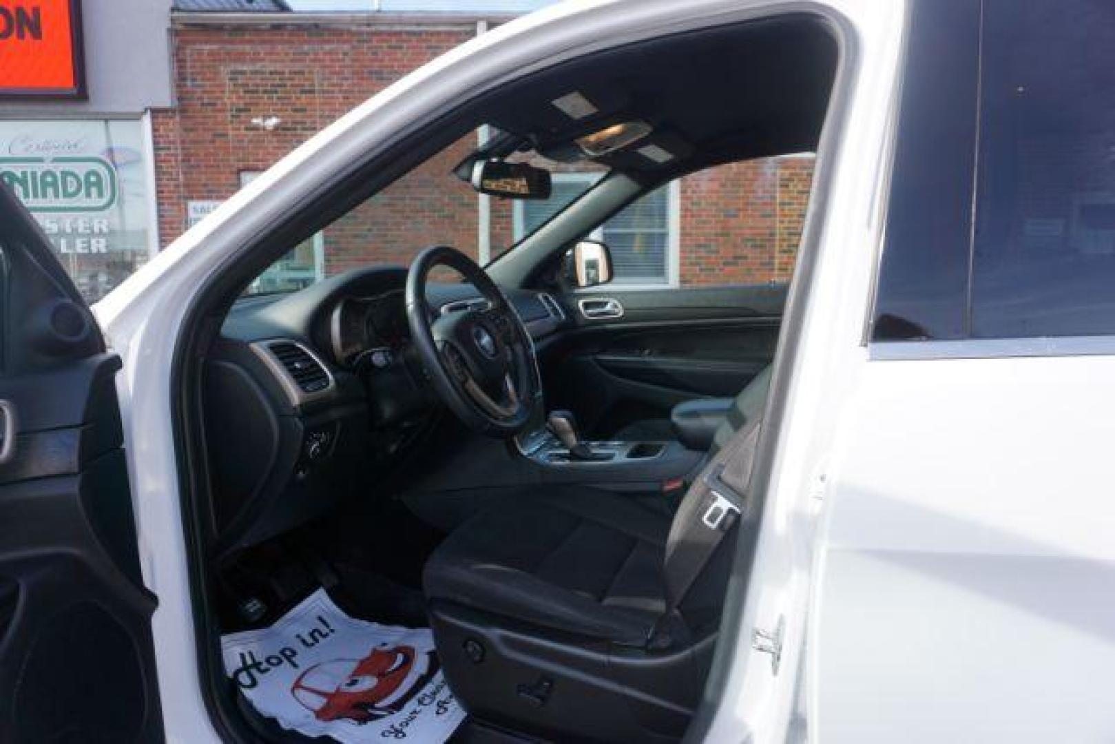 2016 Bright White Clear Coat /Black, cloth Jeep Grand Cherokee Laredo 4WD (1C4RJFAG1GC) with an 3.6L V6 DOHC 24V engine, 8-Speed Automatic transmission, located at 312 Centre Ave, Schuylkill Haven, PA, 17972, (570) 593-5278, 40.638130, -76.177383 - back up camera, locking/limited slip diff, luggage rack, luggage rack, rear parking sensors - Photo#21