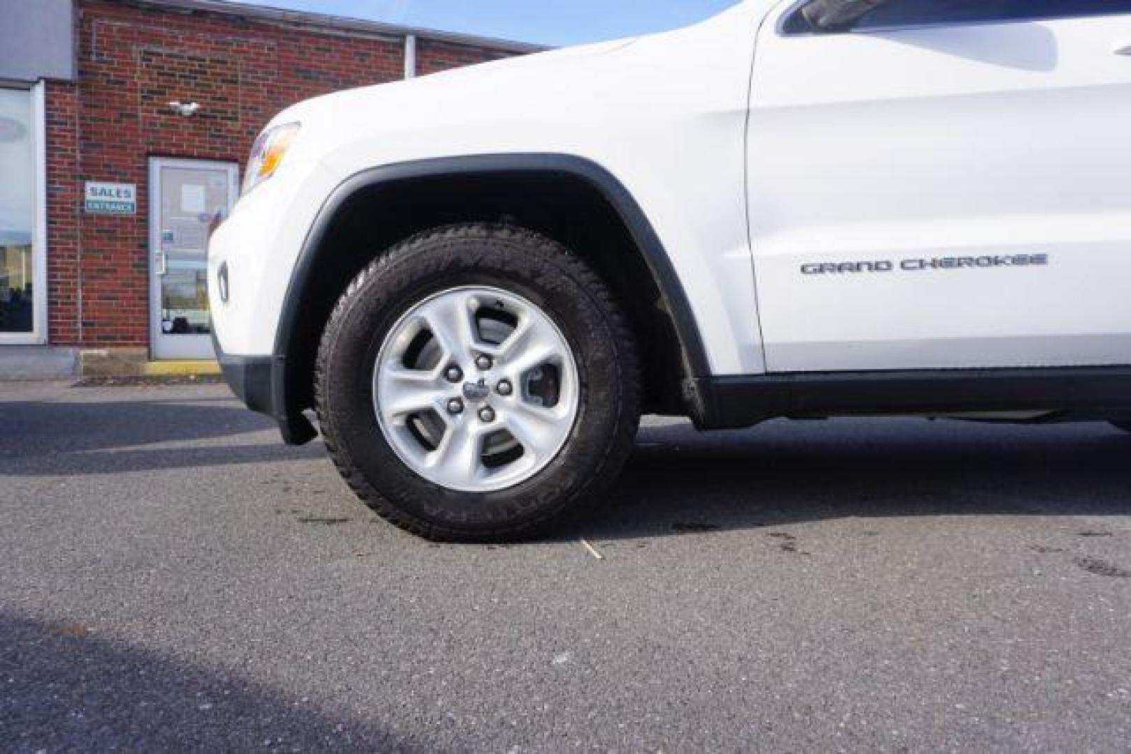 2016 Bright White Clear Coat /Black, cloth Jeep Grand Cherokee Laredo 4WD (1C4RJFAG1GC) with an 3.6L V6 DOHC 24V engine, 8-Speed Automatic transmission, located at 312 Centre Ave, Schuylkill Haven, PA, 17972, (570) 593-5278, 40.638130, -76.177383 - back up camera, locking/limited slip diff, luggage rack, luggage rack, rear parking sensors - Photo#2