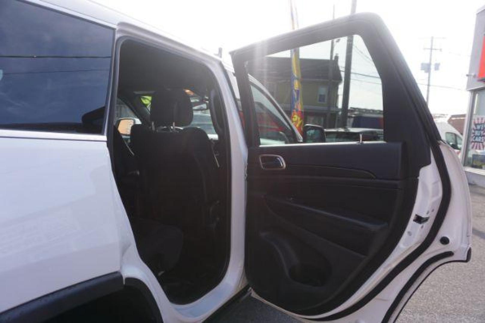 2016 Bright White Clear Coat /Black, cloth Jeep Grand Cherokee Laredo 4WD (1C4RJFAG1GC) with an 3.6L V6 DOHC 24V engine, 8-Speed Automatic transmission, located at 312 Centre Ave, Schuylkill Haven, PA, 17972, (570) 593-5278, 40.638130, -76.177383 - back up camera, locking/limited slip diff, luggage rack, luggage rack, rear parking sensors - Photo#40