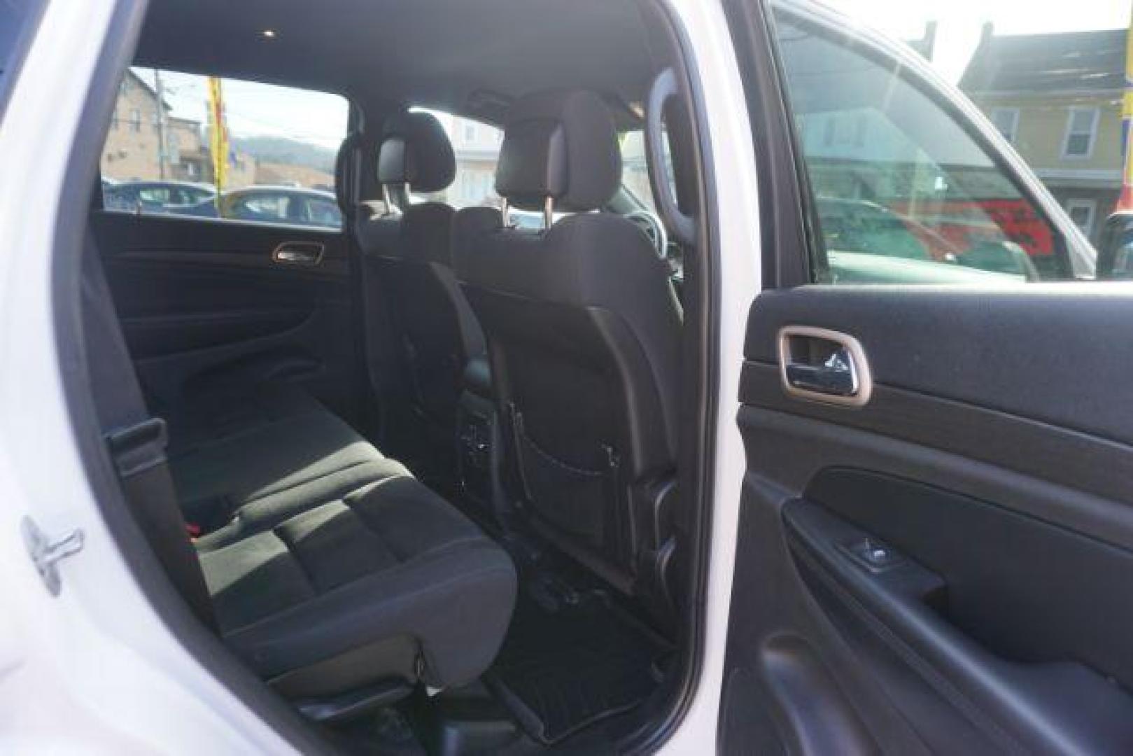 2016 Bright White Clear Coat /Black, cloth Jeep Grand Cherokee Laredo 4WD (1C4RJFAG1GC) with an 3.6L V6 DOHC 24V engine, 8-Speed Automatic transmission, located at 312 Centre Ave, Schuylkill Haven, PA, 17972, (570) 593-5278, 40.638130, -76.177383 - back up camera, locking/limited slip diff, luggage rack, luggage rack, rear parking sensors - Photo#42