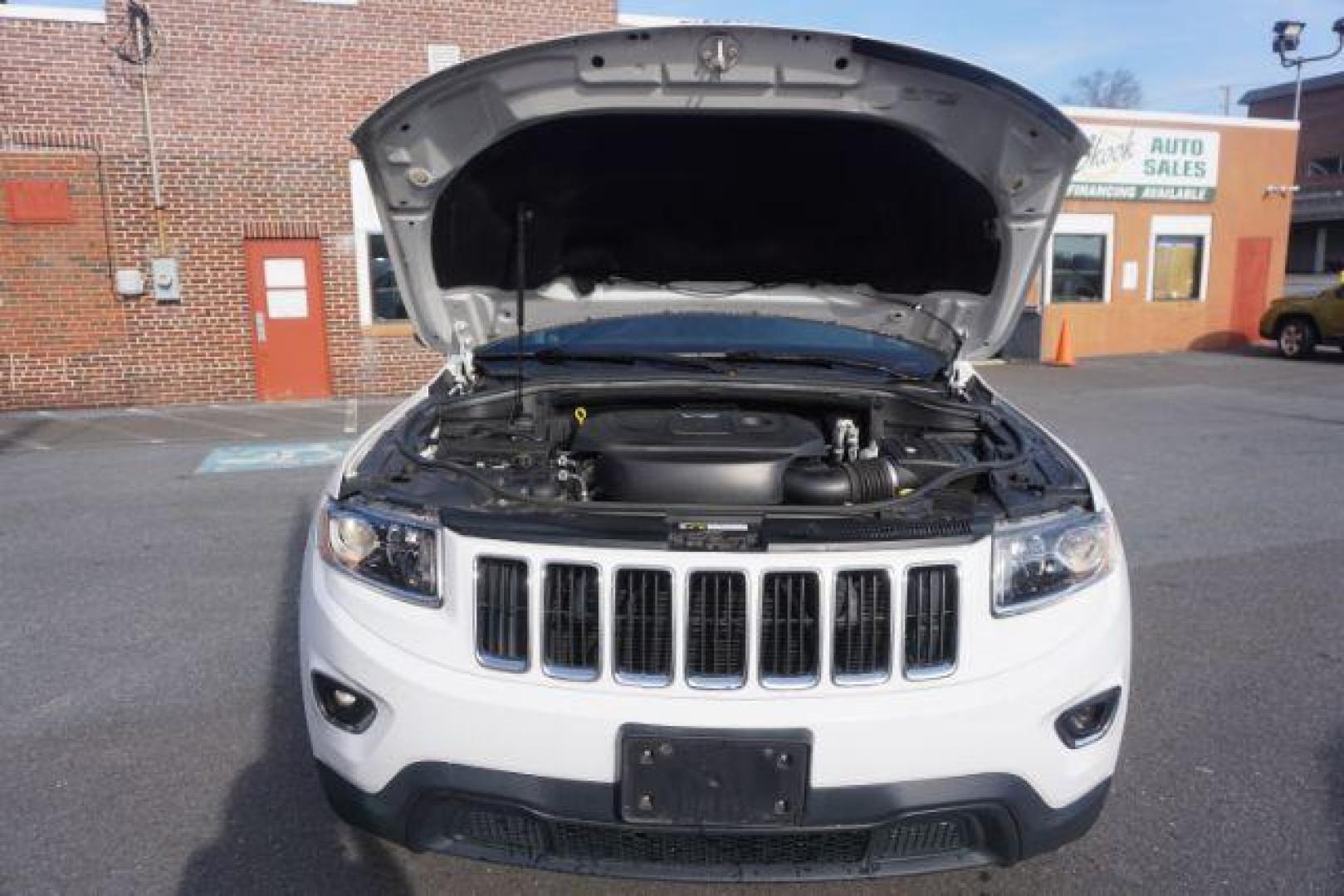 2016 Bright White Clear Coat /Black, cloth Jeep Grand Cherokee Laredo 4WD (1C4RJFAG1GC) with an 3.6L V6 DOHC 24V engine, 8-Speed Automatic transmission, located at 312 Centre Ave, Schuylkill Haven, PA, 17972, (570) 593-5278, 40.638130, -76.177383 - back up camera, locking/limited slip diff, luggage rack, luggage rack, rear parking sensors - Photo#51