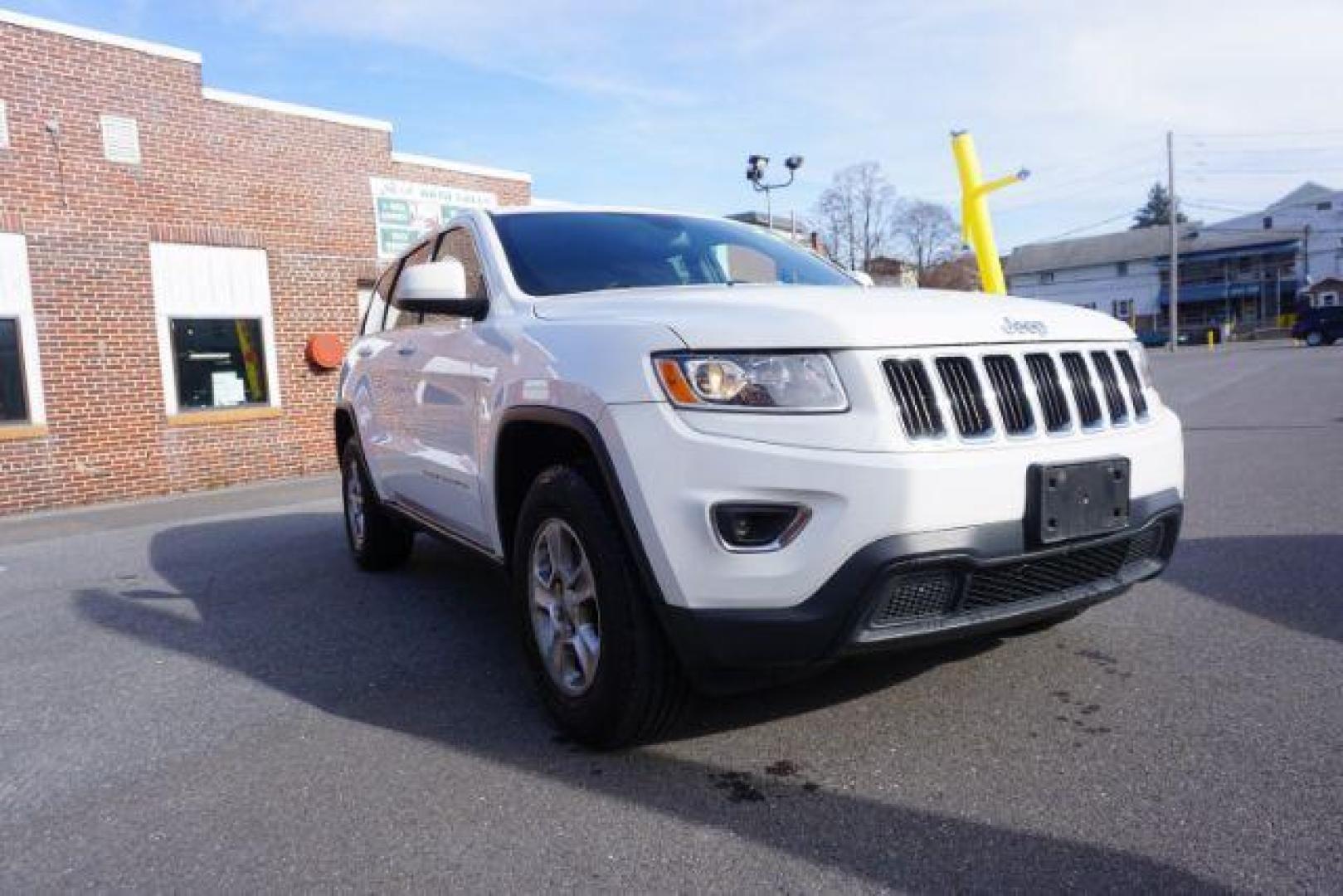 2016 Bright White Clear Coat /Black, cloth Jeep Grand Cherokee Laredo 4WD (1C4RJFAG1GC) with an 3.6L V6 DOHC 24V engine, 8-Speed Automatic transmission, located at 312 Centre Ave, Schuylkill Haven, PA, 17972, (570) 593-5278, 40.638130, -76.177383 - back up camera, locking/limited slip diff, luggage rack, luggage rack, rear parking sensors - Photo#7