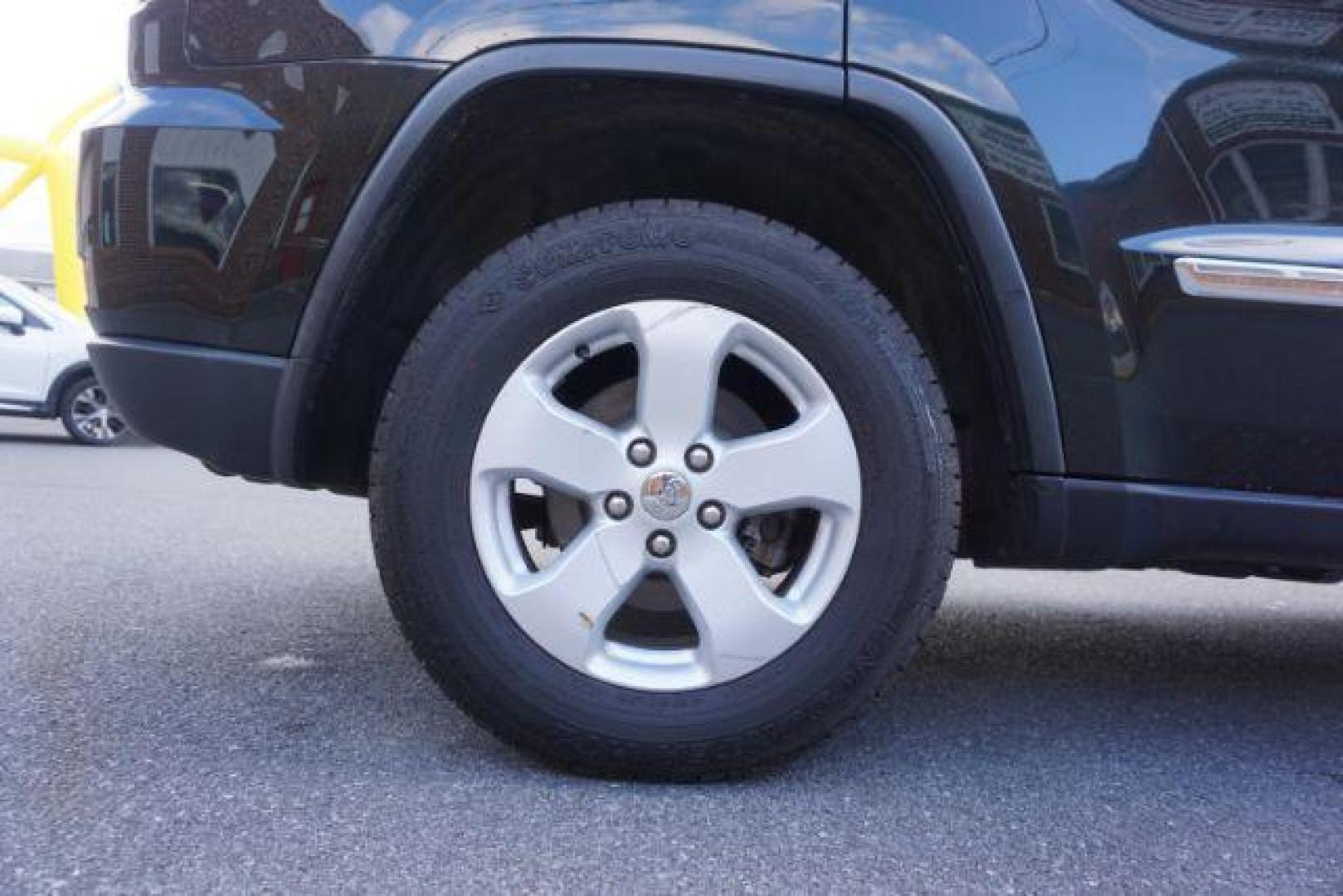 2012 Brilliant Black Crystal Pearl /Black Leather Interior Jeep Grand Cherokee Laredo 4WD (1C4RJFAGXCC) with an 3.6L V6 DOHC 24V engine, 5-Speed Automatic transmission, located at 312 Centre Ave, Schuylkill Haven, PA, 17972, (570) 593-5278, 40.638130, -76.177383 - automatic climate control, back up camera, heated front seats, leather seats, navigation, power liftgate, power sunroof, rear parking sensors - Photo#9