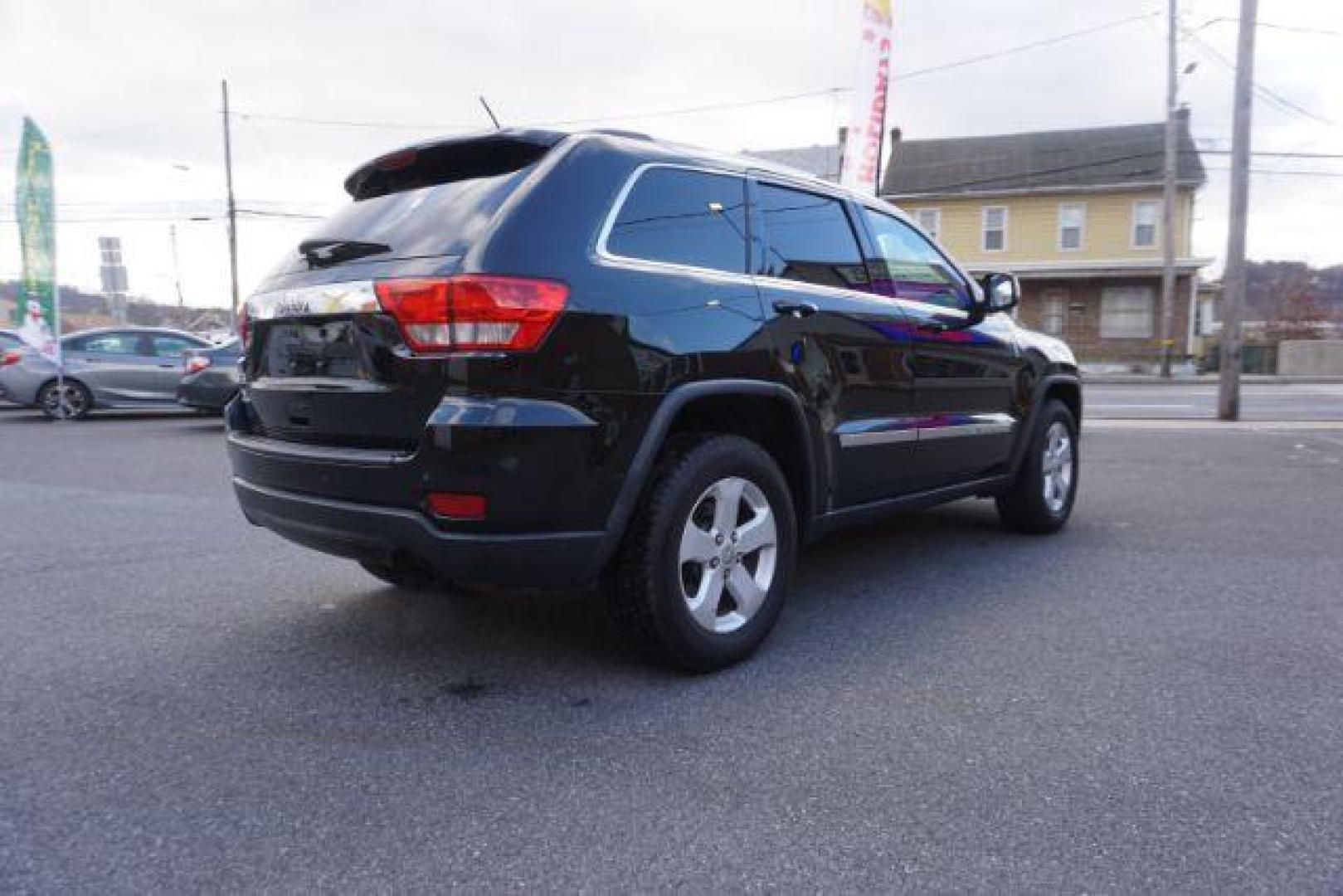 2012 Brilliant Black Crystal Pearl /Black Leather Interior Jeep Grand Cherokee Laredo 4WD (1C4RJFAGXCC) with an 3.6L V6 DOHC 24V engine, 5-Speed Automatic transmission, located at 312 Centre Ave, Schuylkill Haven, PA, 17972, (570) 593-5278, 40.638130, -76.177383 - automatic climate control, back up camera, heated front seats, leather seats, navigation, power liftgate, power sunroof, rear parking sensors - Photo#11