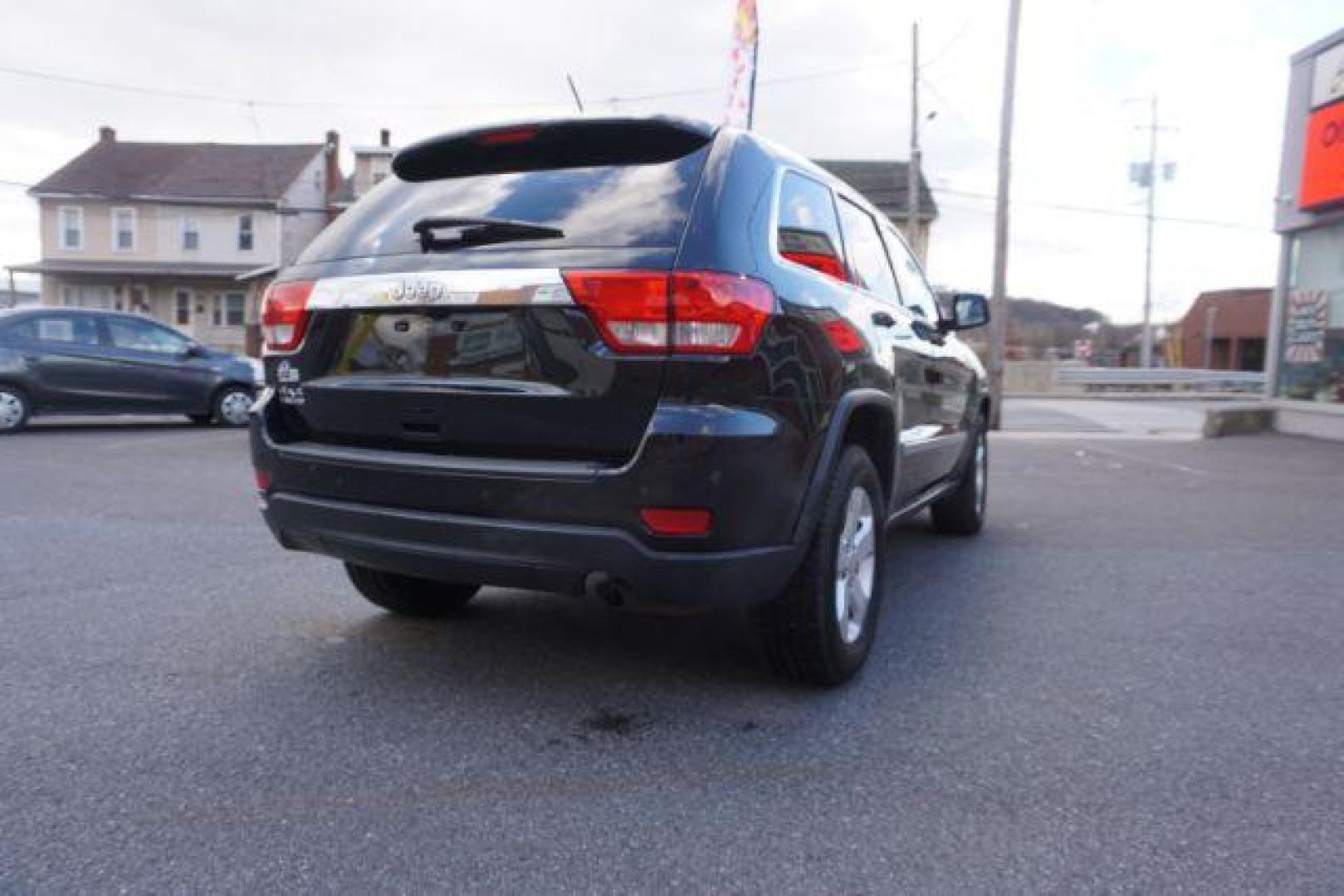 2012 Brilliant Black Crystal Pearl /Black Leather Interior Jeep Grand Cherokee Laredo 4WD (1C4RJFAGXCC) with an 3.6L V6 DOHC 24V engine, 5-Speed Automatic transmission, located at 312 Centre Ave, Schuylkill Haven, PA, 17972, (570) 593-5278, 40.638130, -76.177383 - automatic climate control, back up camera, heated front seats, leather seats, navigation, power liftgate, power sunroof, rear parking sensors - Photo#12