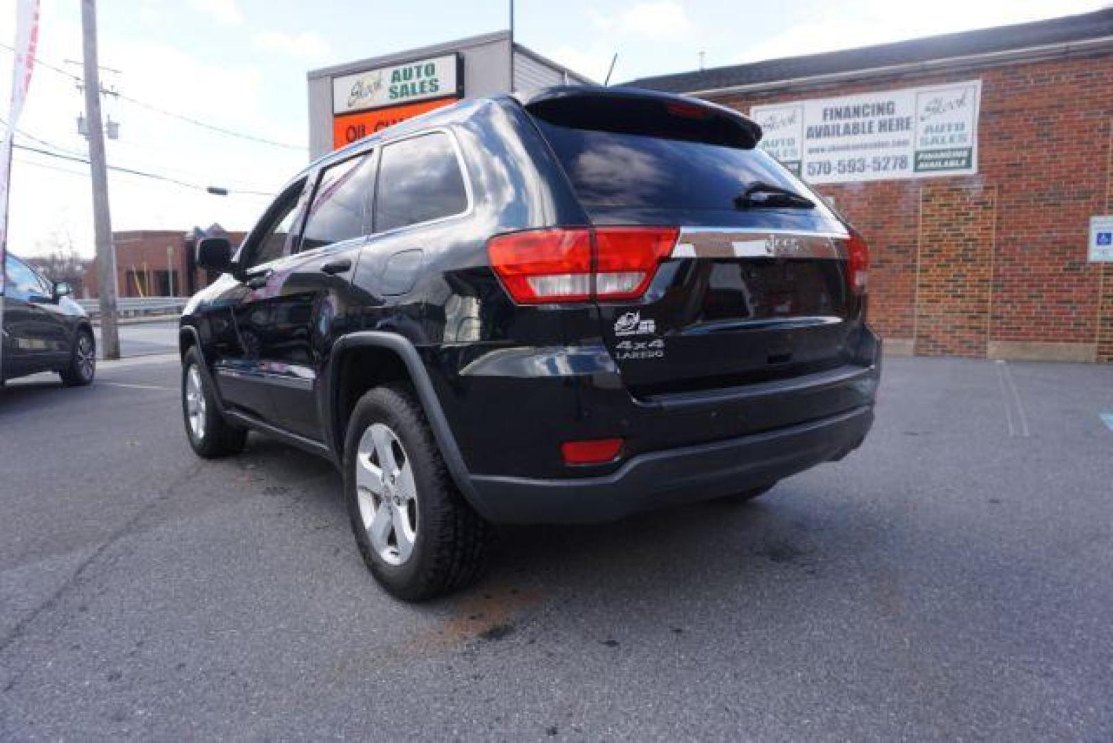 2012 Brilliant Black Crystal Pearl /Black Leather Interior Jeep Grand Cherokee Laredo 4WD (1C4RJFAGXCC) with an 3.6L V6 DOHC 24V engine, 5-Speed Automatic transmission, located at 312 Centre Ave, Schuylkill Haven, PA, 17972, (570) 593-5278, 40.638130, -76.177383 - automatic climate control, back up camera, heated front seats, leather seats, navigation, power liftgate, power sunroof, rear parking sensors - Photo#15