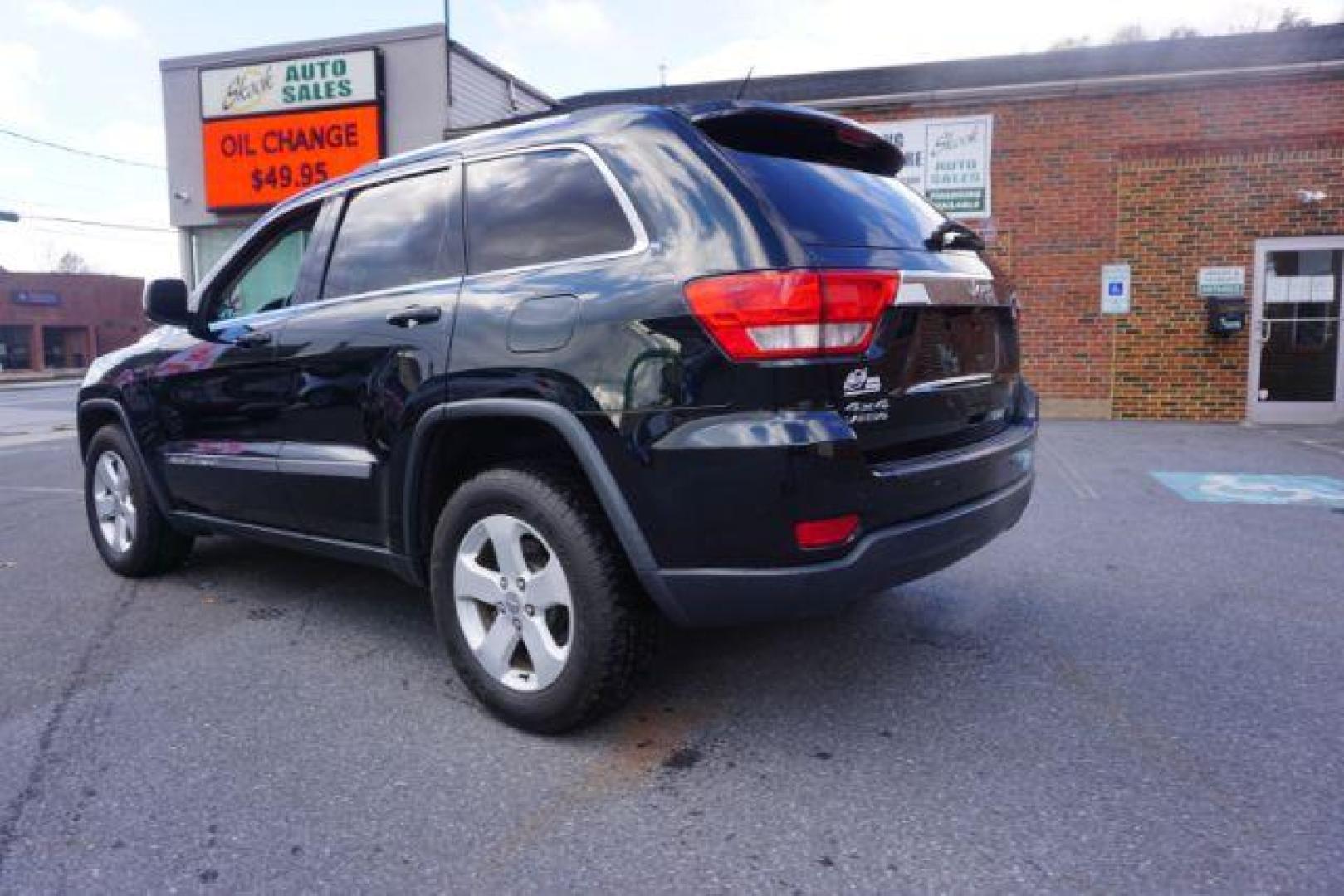 2012 Brilliant Black Crystal Pearl /Black Leather Interior Jeep Grand Cherokee Laredo 4WD (1C4RJFAGXCC) with an 3.6L V6 DOHC 24V engine, 5-Speed Automatic transmission, located at 312 Centre Ave, Schuylkill Haven, PA, 17972, (570) 593-5278, 40.638130, -76.177383 - automatic climate control, back up camera, heated front seats, leather seats, navigation, power liftgate, power sunroof, rear parking sensors - Photo#16